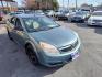 2009 Green Saturn Aura XE (1G8ZS57B49F) with an 2.4L L4 DOHC 16V engine, 4-Speed Automatic Overdrive transmission, located at 5700 Curlew Drive, Norfolk, VA, 23502, (757) 455-6330, 36.841885, -76.209412 - Photo#4