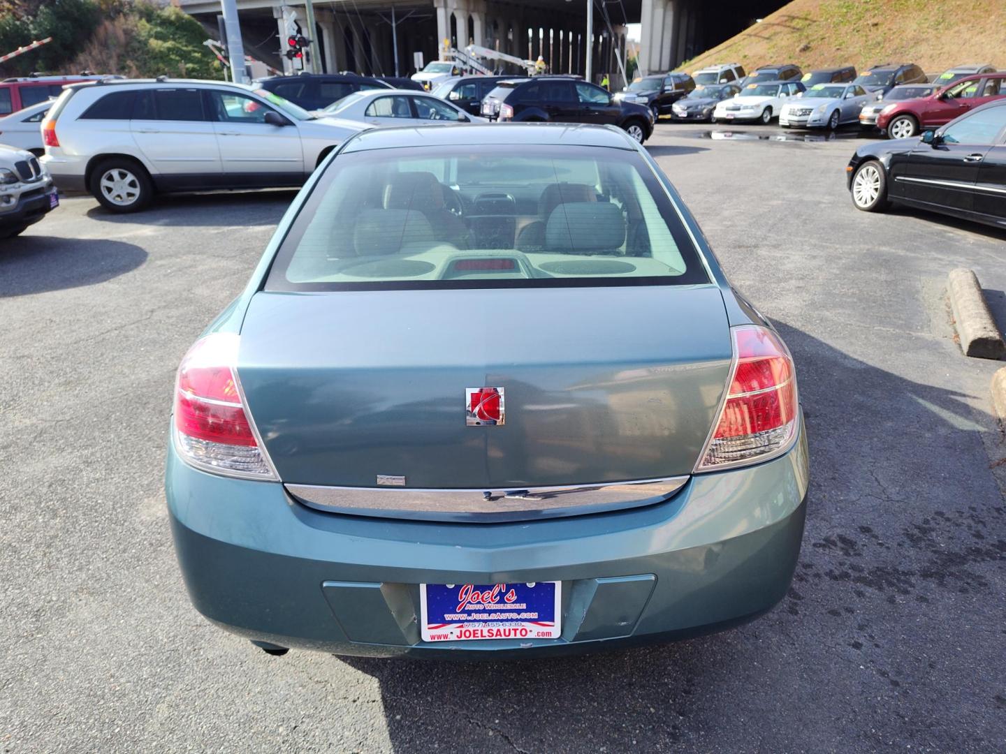 2009 Green Saturn Aura XE (1G8ZS57B49F) with an 2.4L L4 DOHC 16V engine, 4-Speed Automatic Overdrive transmission, located at 5700 Curlew Drive, Norfolk, VA, 23502, (757) 455-6330, 36.841885, -76.209412 - Photo#12