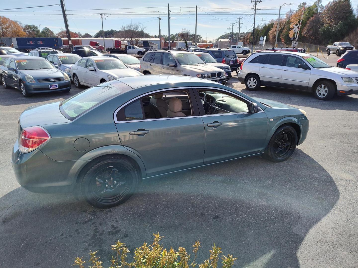 2009 Green Saturn Aura XE (1G8ZS57B49F) with an 2.4L L4 DOHC 16V engine, 4-Speed Automatic Overdrive transmission, located at 5700 Curlew Drive, Norfolk, VA, 23502, (757) 455-6330, 36.841885, -76.209412 - Photo#14