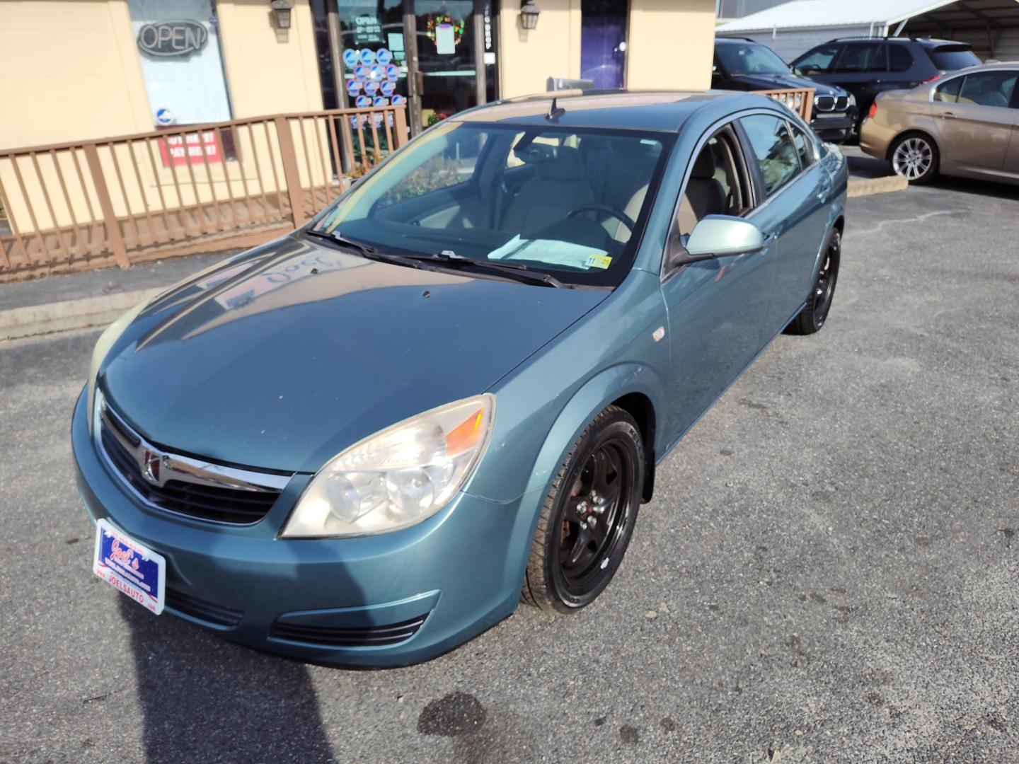 2009 Green Saturn Aura XE (1G8ZS57B49F) with an 2.4L L4 DOHC 16V engine, 4-Speed Automatic Overdrive transmission, located at 5700 Curlew Drive, Norfolk, VA, 23502, (757) 455-6330, 36.841885, -76.209412 - Photo#5