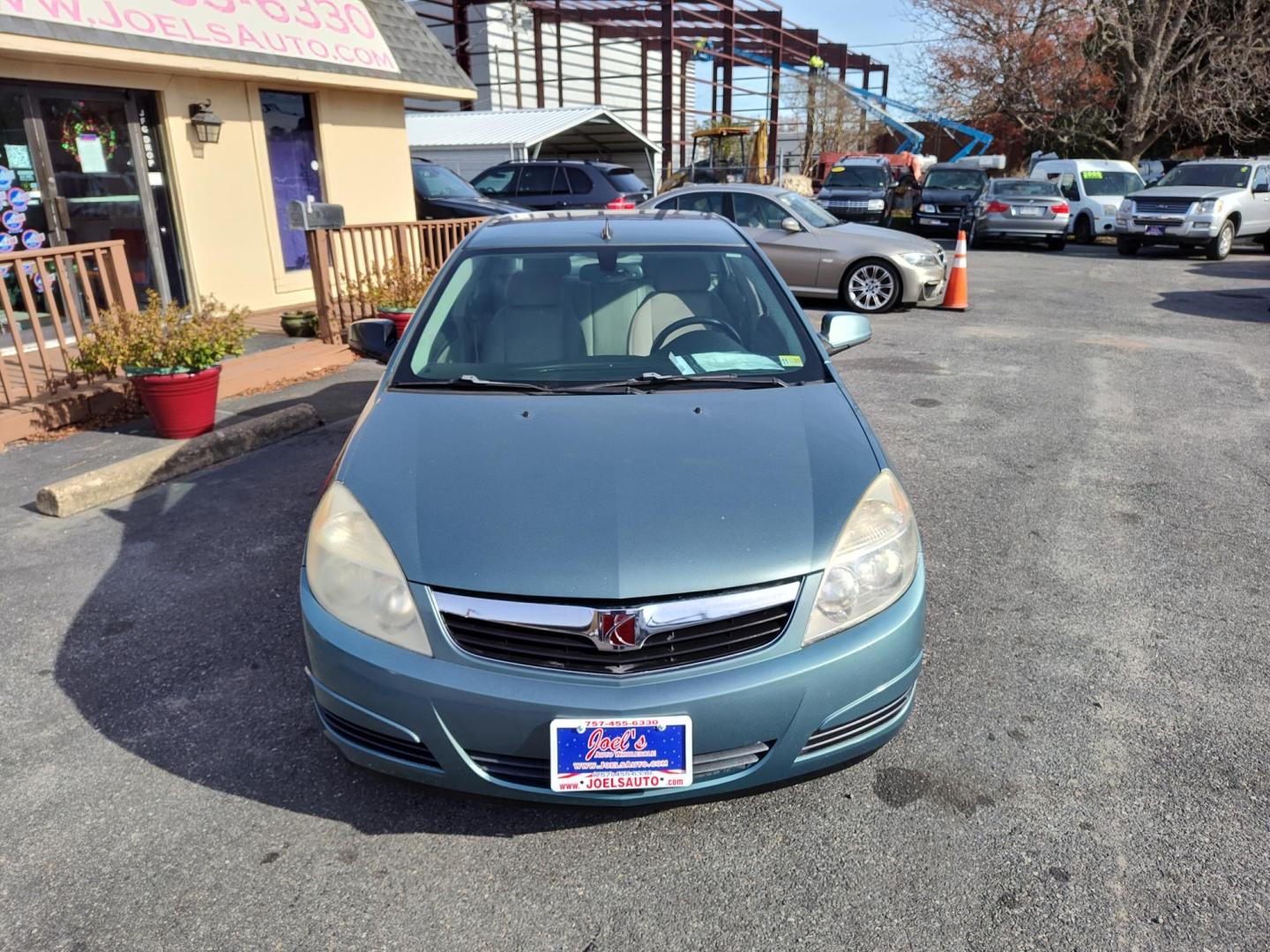 2009 Green Saturn Aura XE (1G8ZS57B49F) with an 2.4L L4 DOHC 16V engine, 4-Speed Automatic Overdrive transmission, located at 5700 Curlew Drive, Norfolk, VA, 23502, (757) 455-6330, 36.841885, -76.209412 - Photo#3