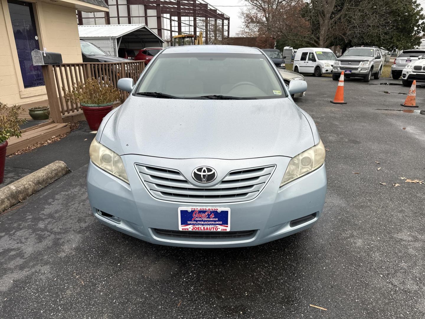 2009 Blue Toyota Camry CE 5-Spd AT (4T1BE46KX9U) with an 2.4L L4 DOHC 16V engine, 5-Speed Automatic Overdrive transmission, located at 5700 Curlew Drive, Norfolk, VA, 23502, (757) 455-6330, 36.841885, -76.209412 - Photo#5