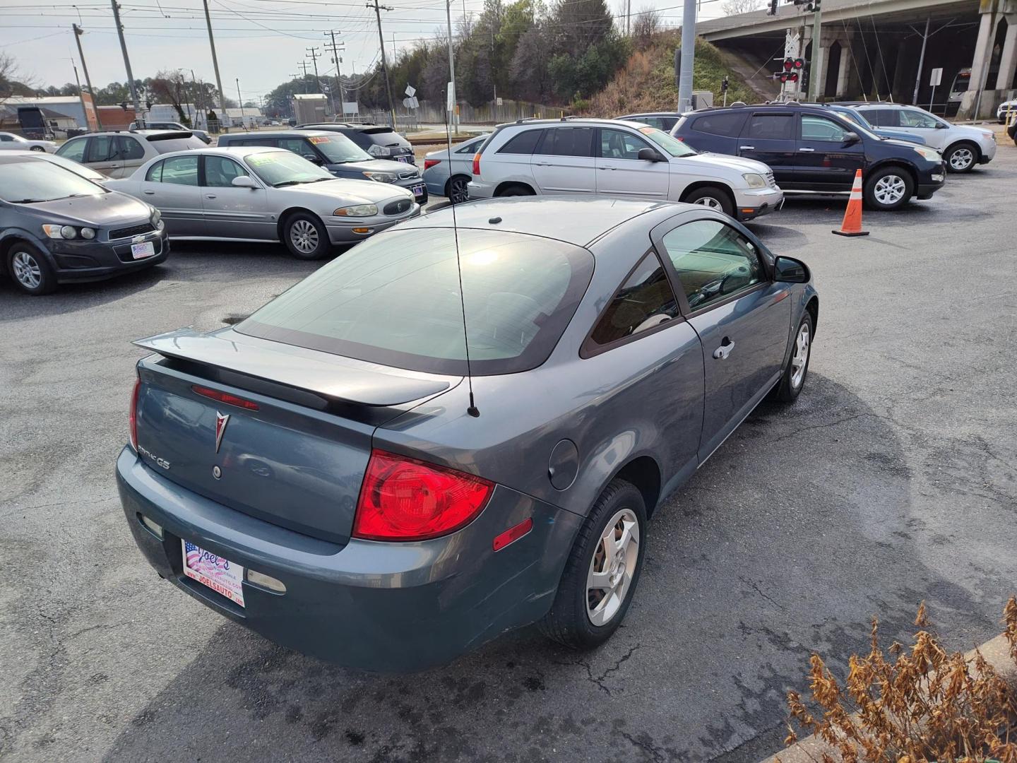 2007 Blue Pontiac G5 Coupe (1G2AL15FX77) with an 2.2L L4 DOHC 16V engine, located at 5700 Curlew Drive, Norfolk, VA, 23502, (757) 455-6330, 36.841885, -76.209412 - Photo#12