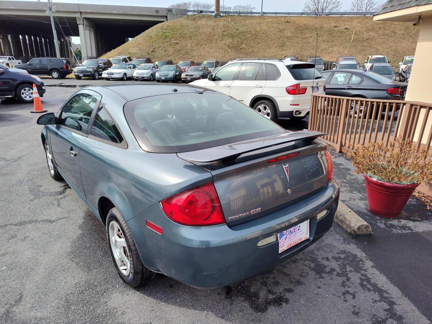 2007 Blue Pontiac G5 Coupe (1G2AL15FX77) with an 2.2L L4 DOHC 16V engine, located at 5700 Curlew Drive, Norfolk, VA, 23502, (757) 455-6330, 36.841885, -76.209412 - Photo#10