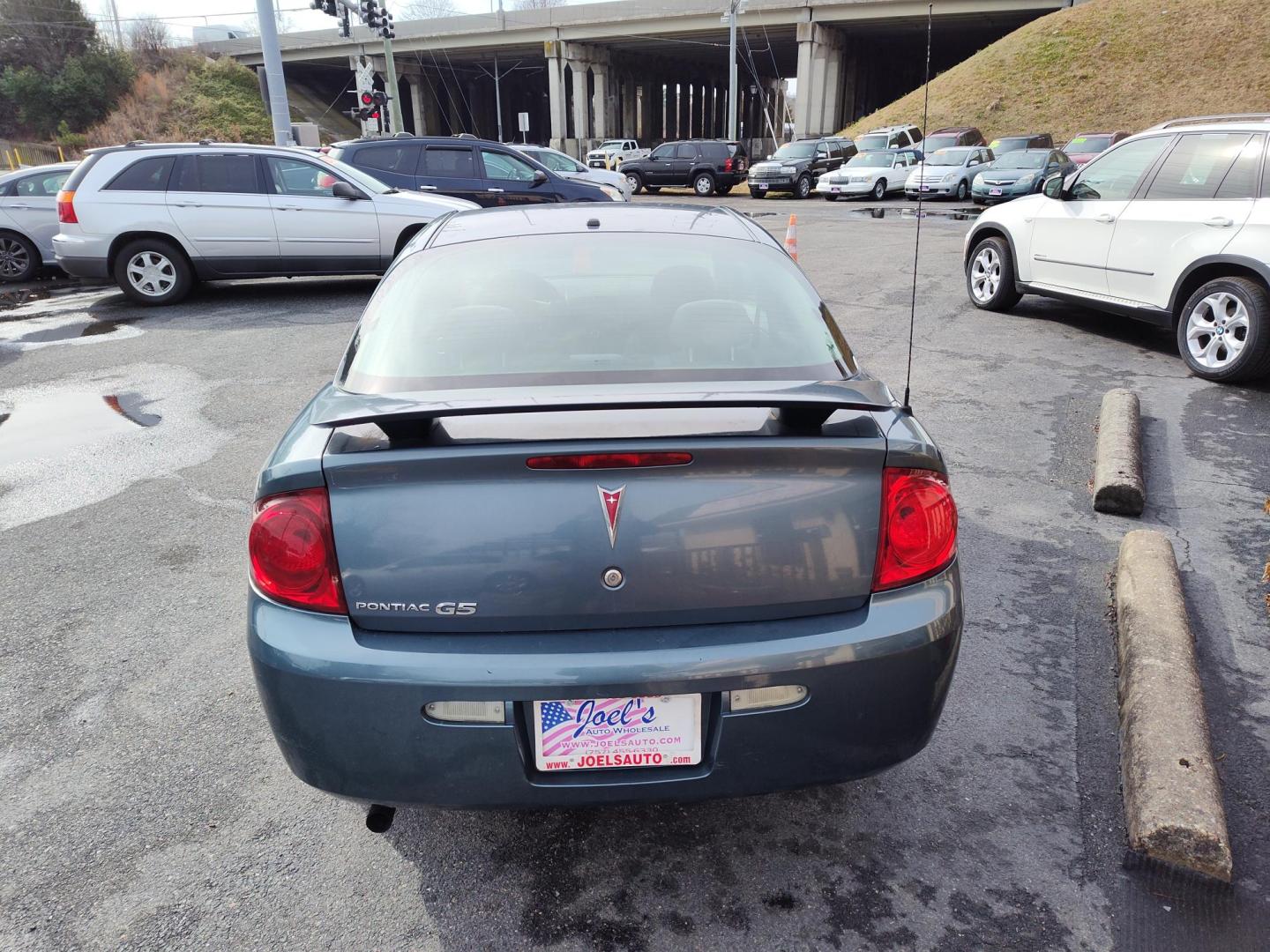 2007 Blue Pontiac G5 Coupe (1G2AL15FX77) with an 2.2L L4 DOHC 16V engine, located at 5700 Curlew Drive, Norfolk, VA, 23502, (757) 455-6330, 36.841885, -76.209412 - Photo#11