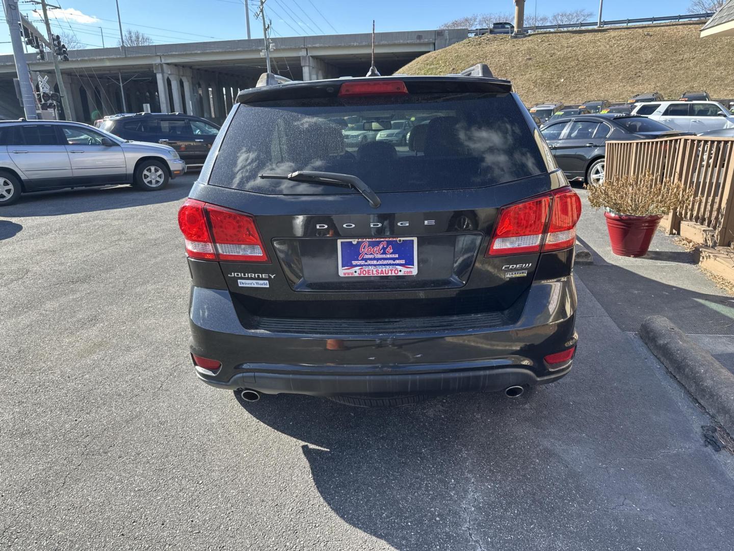 2012 Black Dodge Journey Crew (3C4PDCDG9CT) with an 3.6L V6 DOHC 24V engine, 6-Speed Automatic transmission, located at 5700 Curlew Drive, Norfolk, VA, 23502, (757) 455-6330, 36.841885, -76.209412 - Photo#2