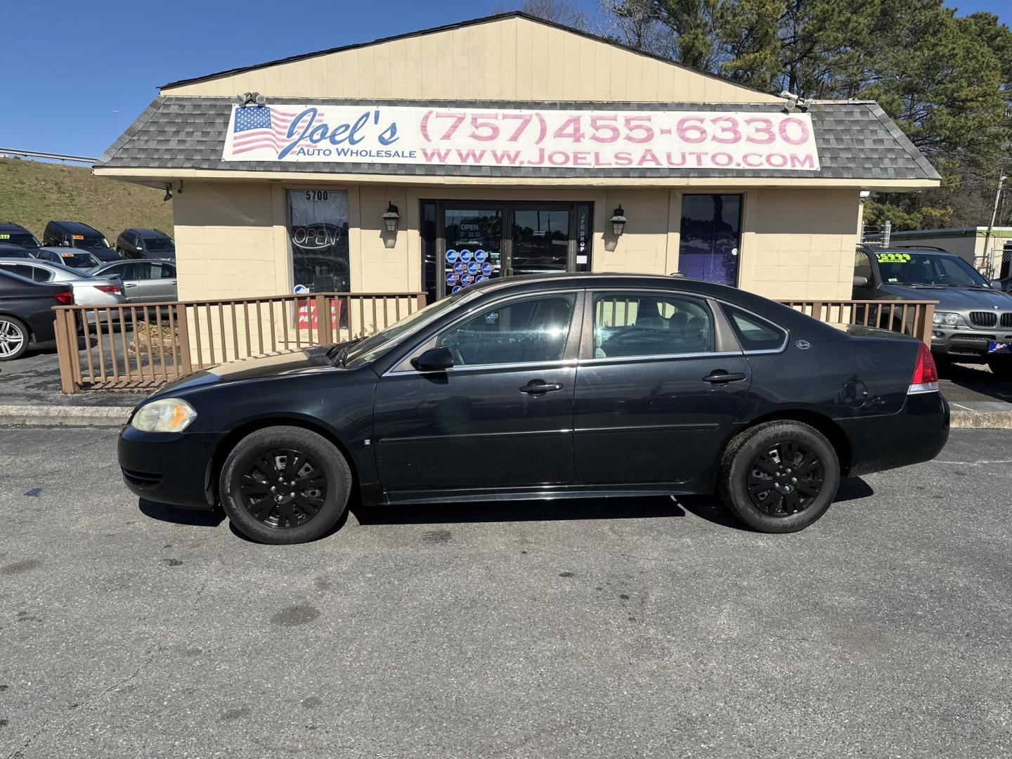 2009 Black Chevrolet Impala LS (2G1WB57K391) with an 3.5L V6 OHV 16V FFV engine, 4-Speed Automatic transmission, located at 5700 Curlew Drive, Norfolk, VA, 23502, (757) 455-6330, 36.841885, -76.209412 - Photo#0