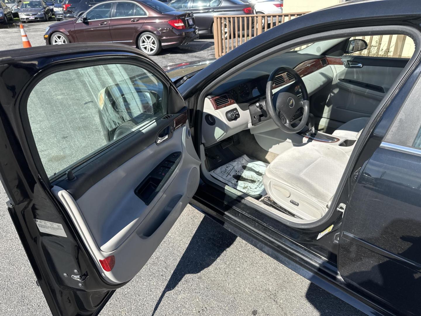 2009 Black Chevrolet Impala LS (2G1WB57K391) with an 3.5L V6 OHV 16V FFV engine, 4-Speed Automatic transmission, located at 5700 Curlew Drive, Norfolk, VA, 23502, (757) 455-6330, 36.841885, -76.209412 - Photo#5