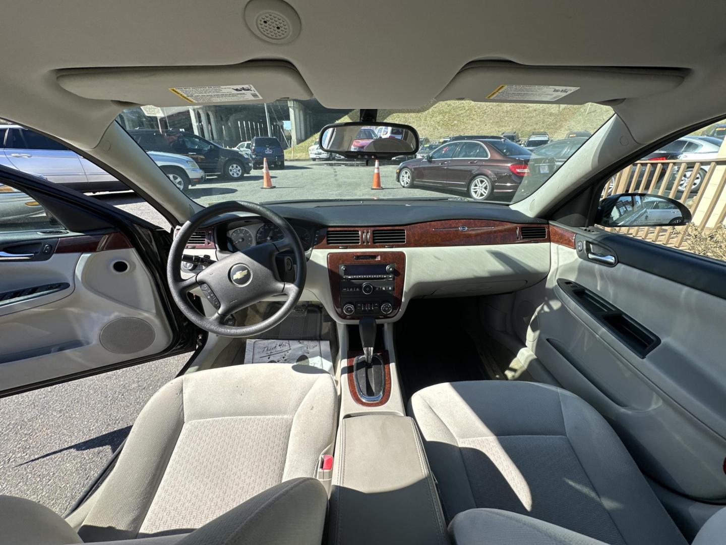 2009 Black Chevrolet Impala LS (2G1WB57K391) with an 3.5L V6 OHV 16V FFV engine, 4-Speed Automatic transmission, located at 5700 Curlew Drive, Norfolk, VA, 23502, (757) 455-6330, 36.841885, -76.209412 - Photo#6