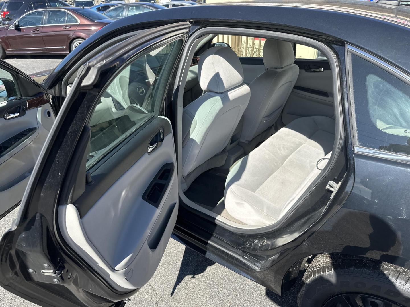 2009 Black Chevrolet Impala LS (2G1WB57K391) with an 3.5L V6 OHV 16V FFV engine, 4-Speed Automatic transmission, located at 5700 Curlew Drive, Norfolk, VA, 23502, (757) 455-6330, 36.841885, -76.209412 - Photo#7