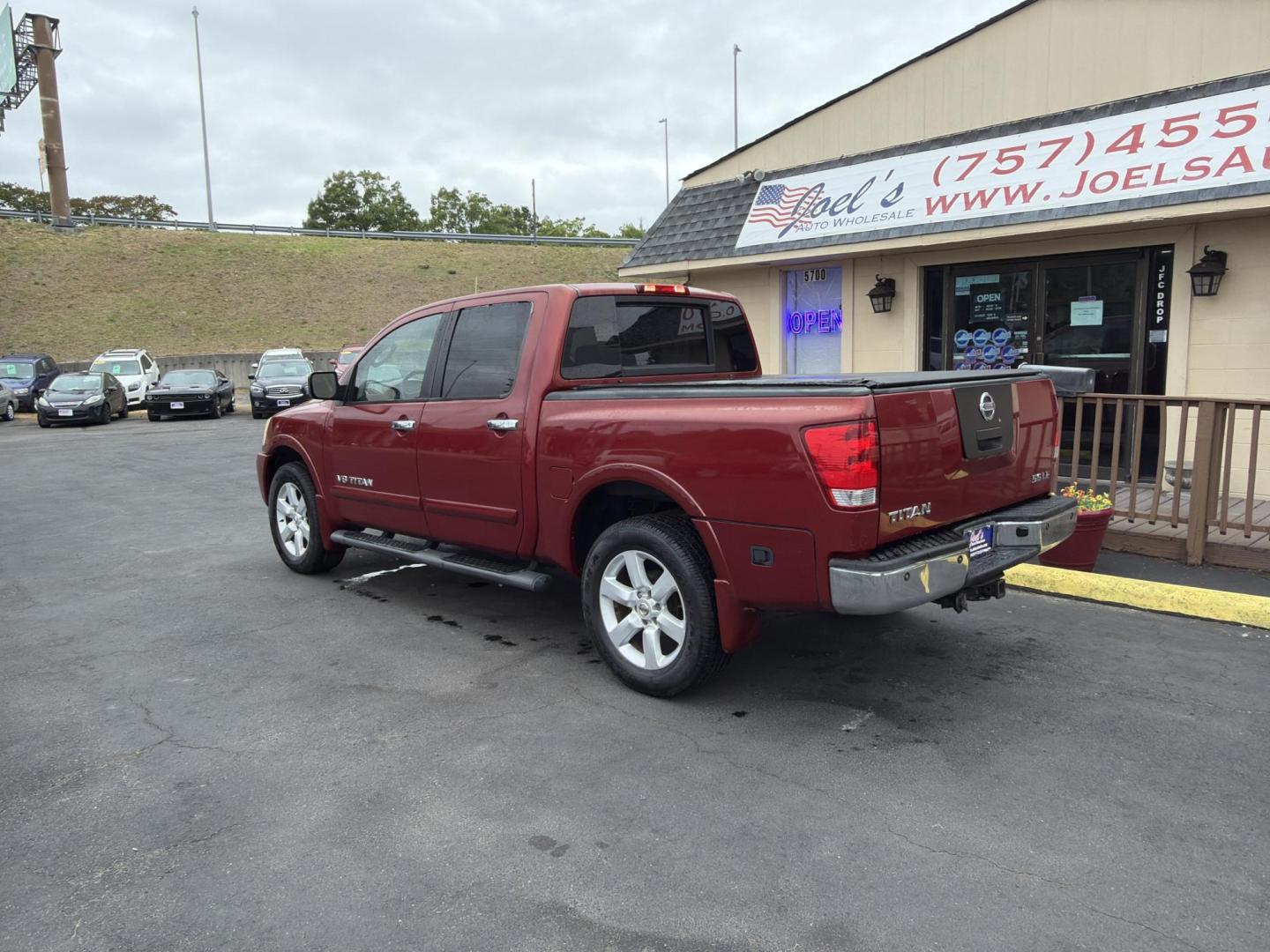 2008 Burgundy Nissan Titan LE Crew Cab 4WD SWB (1N6BA07C48N) with an 5.6L V8 DOHC 32V FFV engine, 5-Speed Automatic transmission, located at 5700 Curlew Drive, Norfolk, VA, 23502, (757) 455-6330, 36.841885, -76.209412 - Photo#2