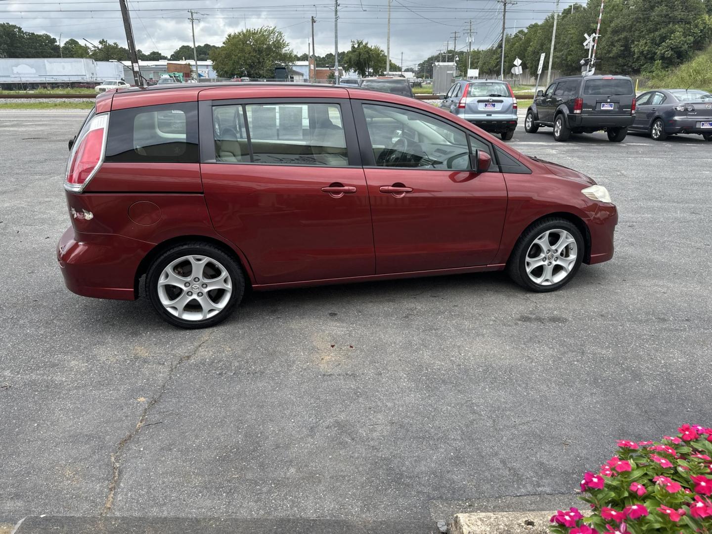 2010 Red Mazda MAZDA5 Grand Touring (JM1CR2W32A0) with an 2.3L L4 DOHC 16V engine, located at 5700 Curlew Drive, Norfolk, VA, 23502, (757) 455-6330, 36.841885, -76.209412 - Photo#3