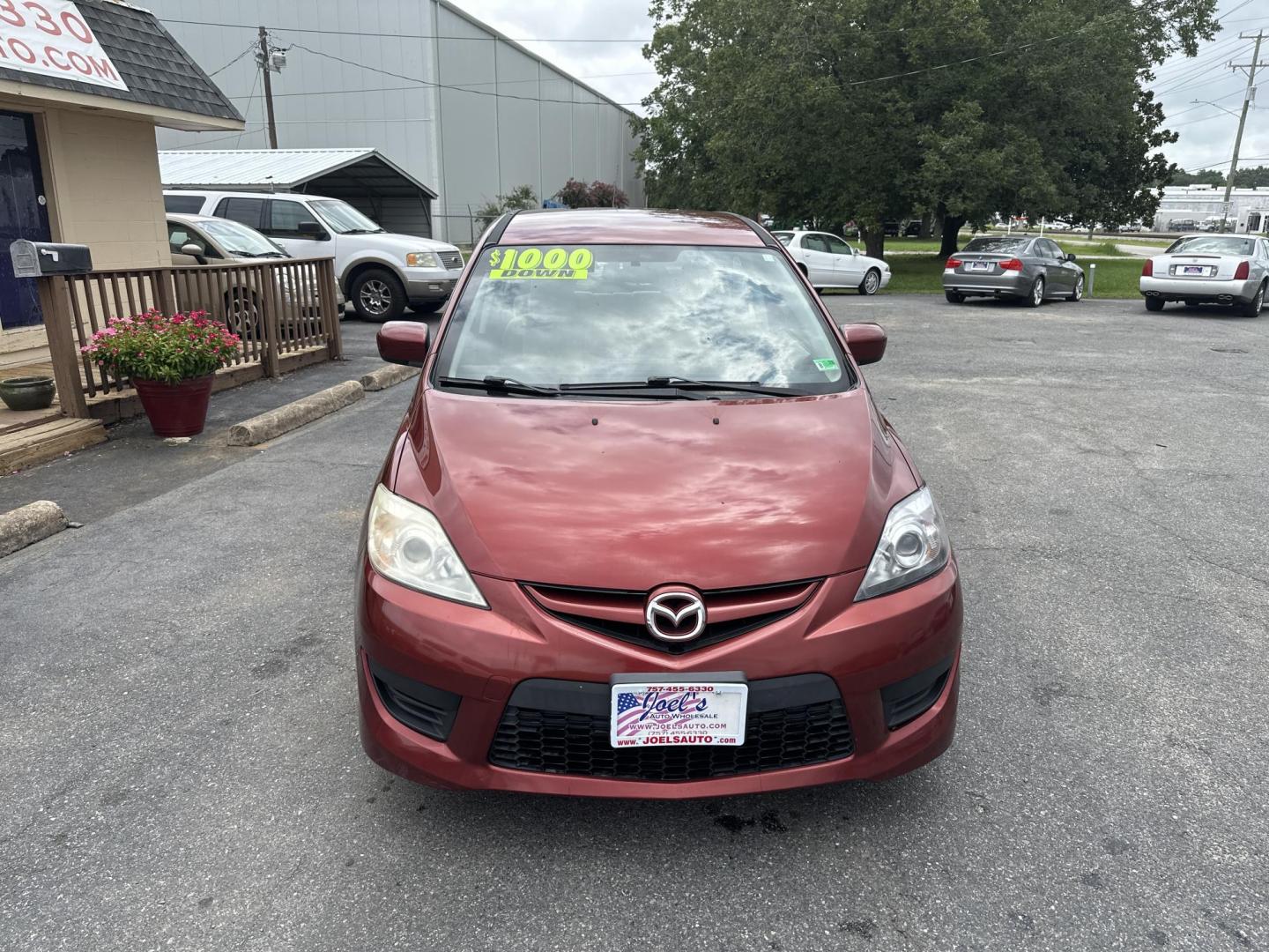 2010 Red Mazda MAZDA5 Grand Touring (JM1CR2W32A0) with an 2.3L L4 DOHC 16V engine, located at 5700 Curlew Drive, Norfolk, VA, 23502, (757) 455-6330, 36.841885, -76.209412 - Photo#4