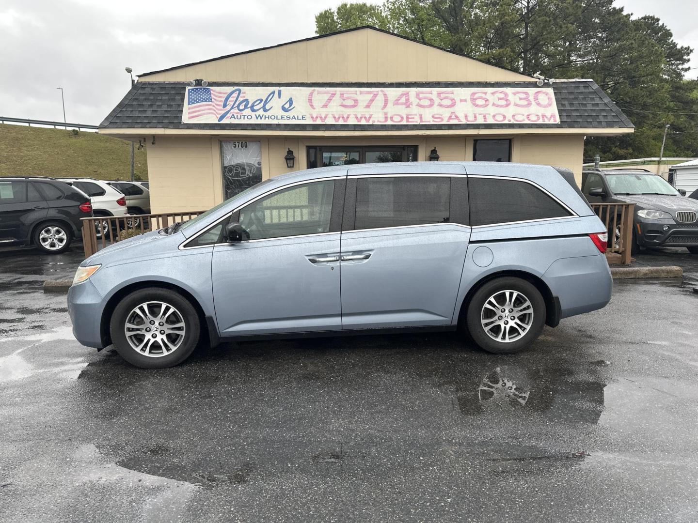 2012 Blue Honda Odyssey EX (5FNRL5H45CB) with an 3.5L V6 SOHC 24V engine, 5-Speed Automatic transmission, located at 5700 Curlew Drive, Norfolk, VA, 23502, (757) 455-6330, 36.841885, -76.209412 - Photo#1