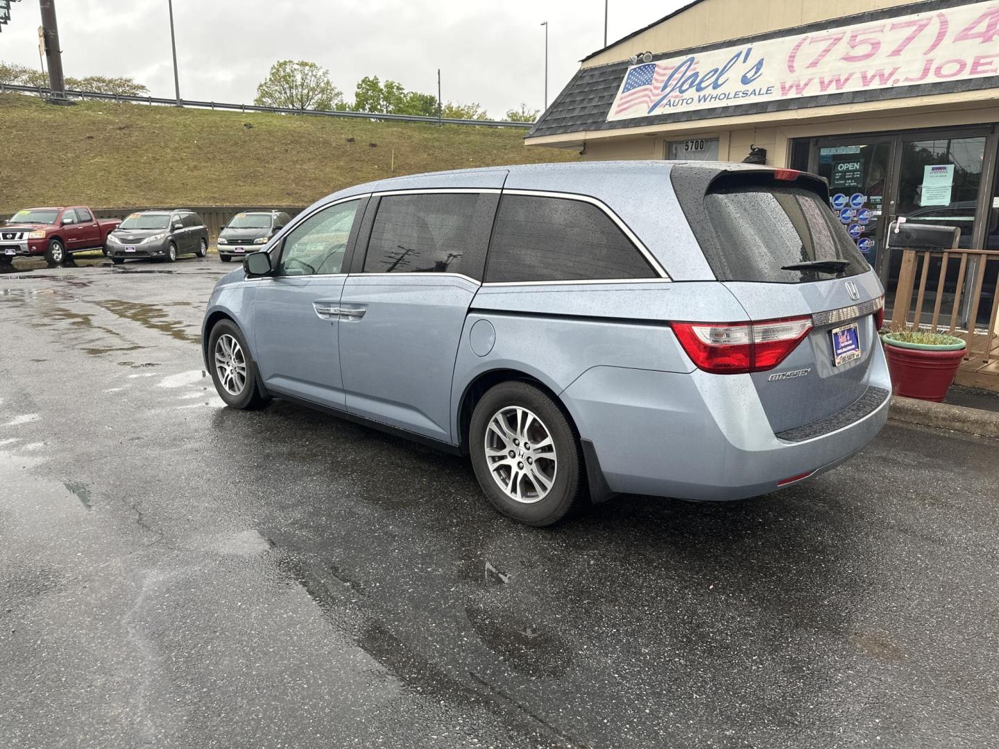 2012 Blue Honda Odyssey EX (5FNRL5H45CB) with an 3.5L V6 SOHC 24V engine, 5-Speed Automatic transmission, located at 5700 Curlew Drive, Norfolk, VA, 23502, (757) 455-6330, 36.841885, -76.209412 - Photo#2