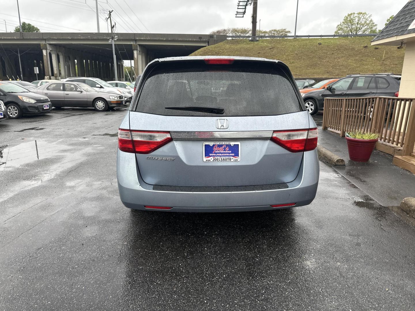2012 Blue Honda Odyssey EX (5FNRL5H45CB) with an 3.5L V6 SOHC 24V engine, 5-Speed Automatic transmission, located at 5700 Curlew Drive, Norfolk, VA, 23502, (757) 455-6330, 36.841885, -76.209412 - Photo#3