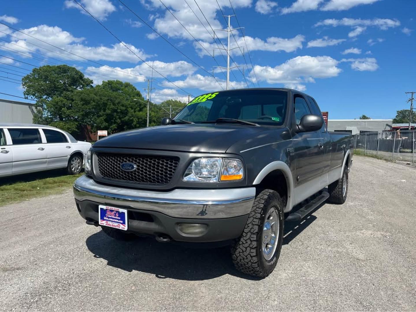 2002 Gray /Gray Ford F-150 Lariat SuperCab Long Bed 4WD (1FTRX18L92N) with an 5.4L V8 SOHC 16V engine, Automatic transmission, located at 5700 Curlew Drive, Norfolk, VA, 23502, (757) 455-6330, 36.841885, -76.209412 - CASH DEAL NO OUTSIDE FINANCING -2002 Ford F150 4x4 Lariat 108k miles! -Rust free! -Extended cab all doors work! -8 foot bed! -1 owner! -New suspension all around -No issues -Ready for a new home -Virginia dealer - Photo#0