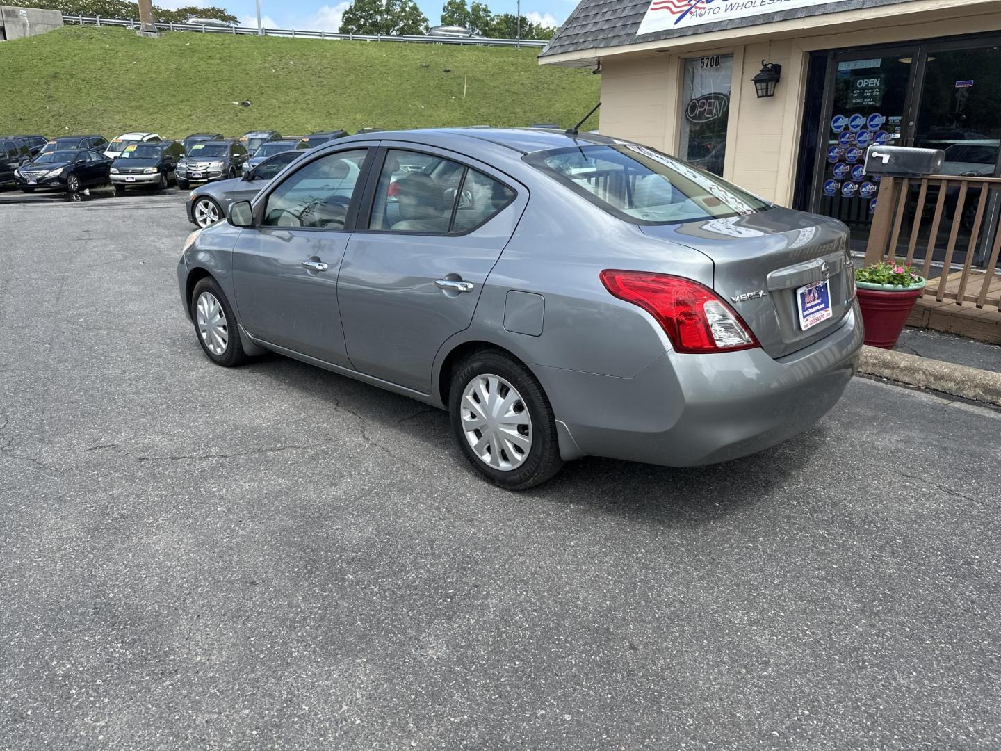 2012 Gray Nissan Versa 1.6 S Sedan (3N1CN7AP0CL) with an 1.6L L4 DOHC 16V engine, Automatic transmission, located at 5700 Curlew Drive, Norfolk, VA, 23502, (757) 455-6330, 36.841885, -76.209412 - Photo#1