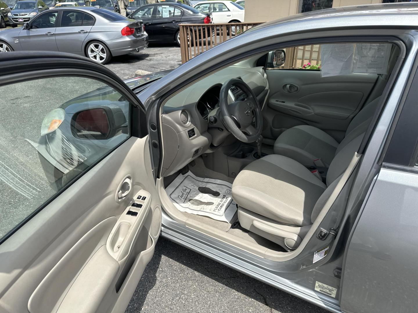 2012 Gray Nissan Versa 1.6 S Sedan (3N1CN7AP0CL) with an 1.6L L4 DOHC 16V engine, Automatic transmission, located at 5700 Curlew Drive, Norfolk, VA, 23502, (757) 455-6330, 36.841885, -76.209412 - Photo#5