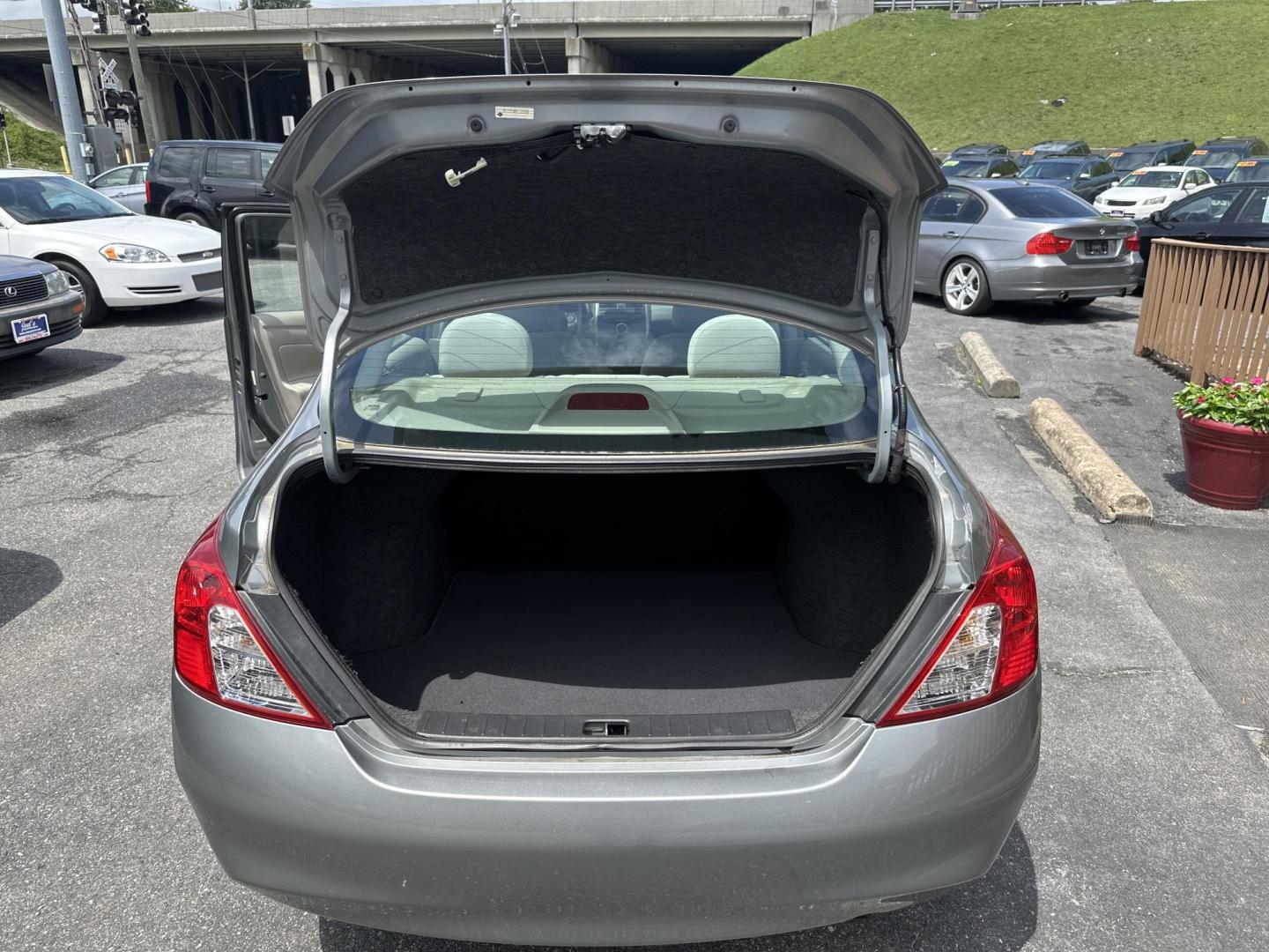 2012 Gray Nissan Versa 1.6 S Sedan (3N1CN7AP0CL) with an 1.6L L4 DOHC 16V engine, Automatic transmission, located at 5700 Curlew Drive, Norfolk, VA, 23502, (757) 455-6330, 36.841885, -76.209412 - Photo#9