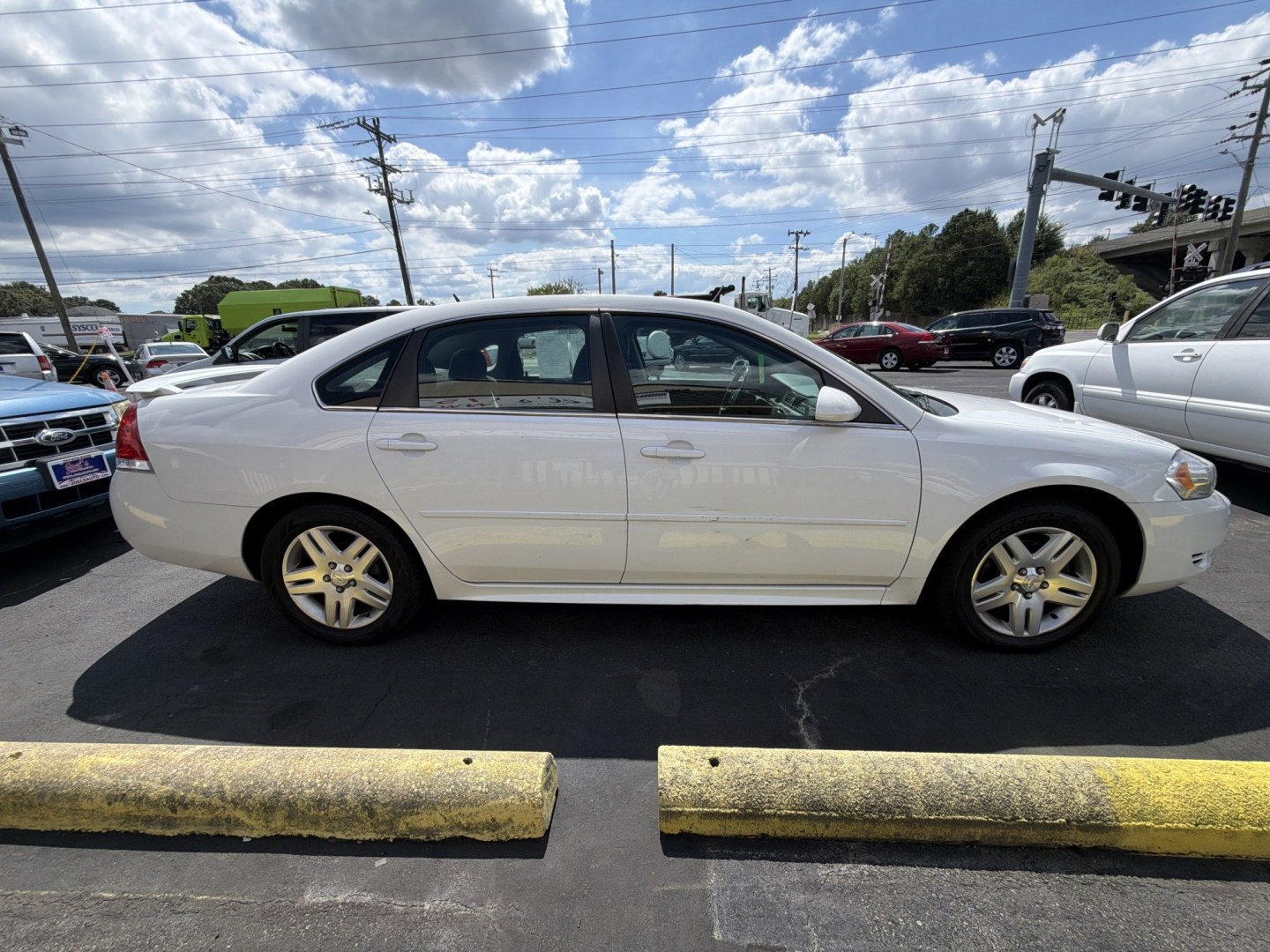 2012 white Chevrolet Impala LT (Fleet) (2G1WG5E31C1) with an 3.6L V6 DOHC 16V FFV engine, 6-Speed Automatic transmission, located at 5700 Curlew Drive, Norfolk, VA, 23502, (757) 455-6330, 36.841885, -76.209412- Photo#3