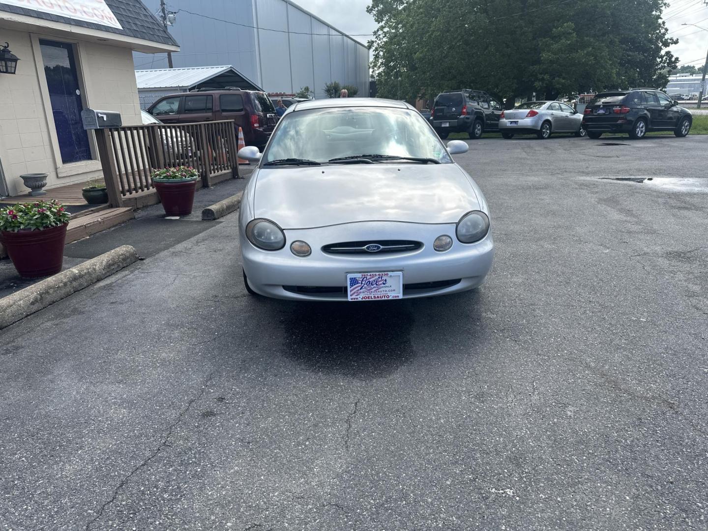 1999 Gray Ford Taurus SE (1FAFP53U0XA) with an 3.0L V6 OHV 12V engine, 4-Speed Automatic Overdrive transmission, located at 5700 Curlew Drive, Norfolk, VA, 23502, (757) 455-6330, 36.841885, -76.209412 - Photo#4