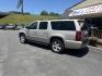 2007 Tan Chevrolet Suburban LS 1500 4WD (1GNFK16377J) with an 5.3L V8 OHV 16V FFV engine, 4-Speed Automatic Overdrive transmission, located at 5700 Curlew Drive, Norfolk, VA, 23502, (757) 455-6330, 36.841885, -76.209412 - Photo#1