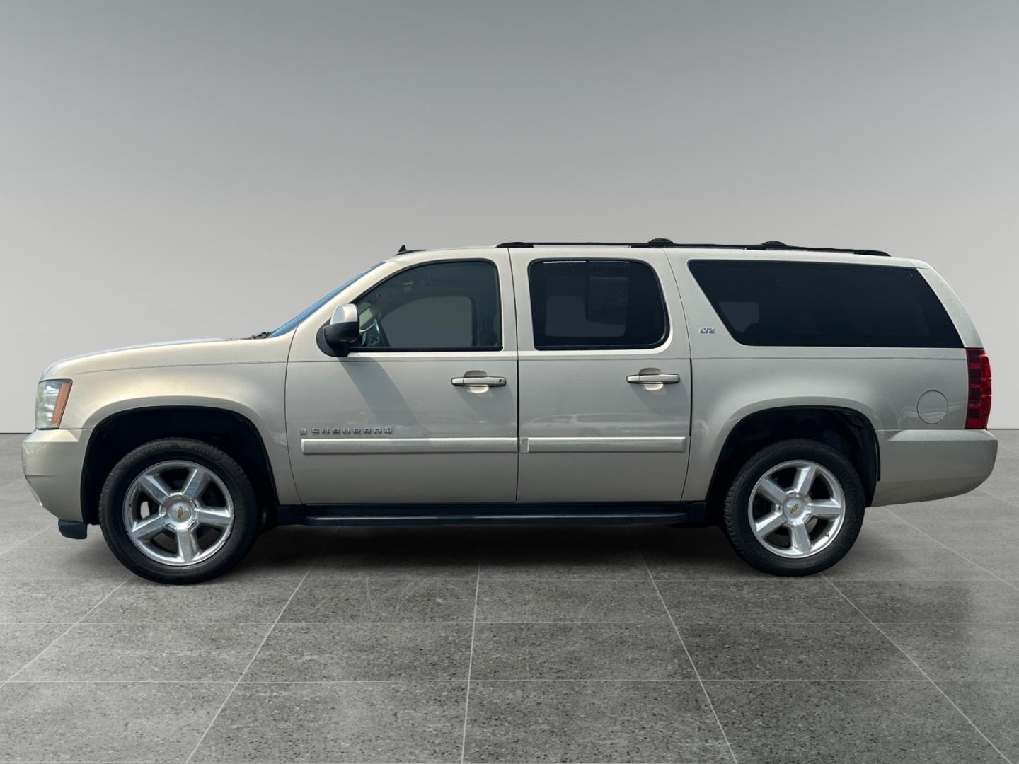 2007 Tan Chevrolet Suburban LS 1500 4WD (1GNFK16377J) with an 5.3L V8 OHV 16V FFV engine, 4-Speed Automatic Overdrive transmission, located at 5700 Curlew Drive, Norfolk, VA, 23502, (757) 455-6330, 36.841885, -76.209412 - Photo#1