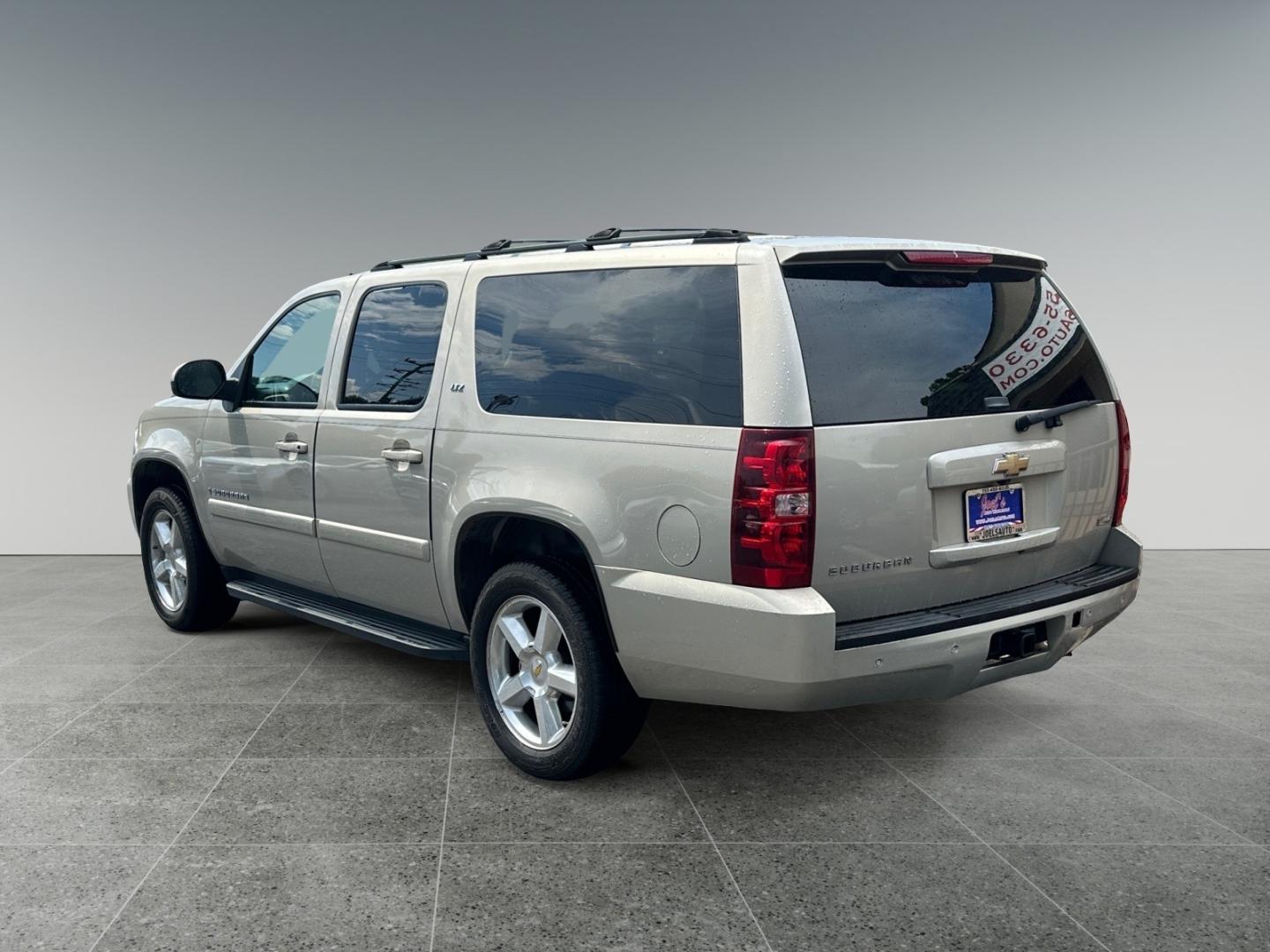 2007 Tan Chevrolet Suburban LS 1500 4WD (1GNFK16377J) with an 5.3L V8 OHV 16V FFV engine, 4-Speed Automatic Overdrive transmission, located at 5700 Curlew Drive, Norfolk, VA, 23502, (757) 455-6330, 36.841885, -76.209412 - Photo#2