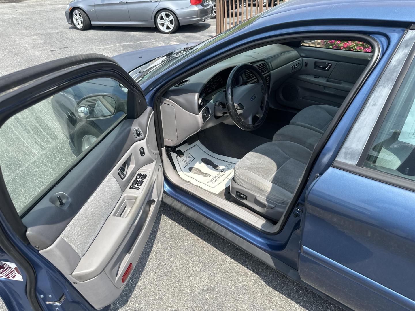 2002 Blue Ford Taurus SES Deluxe (1FAFP55UX2A) with an 3.0L V6 OHV 12V engine, 4-Speed Automatic Overdrive transmission, located at 5700 Curlew Drive, Norfolk, VA, 23502, (757) 455-6330, 36.841885, -76.209412 - Photo#5