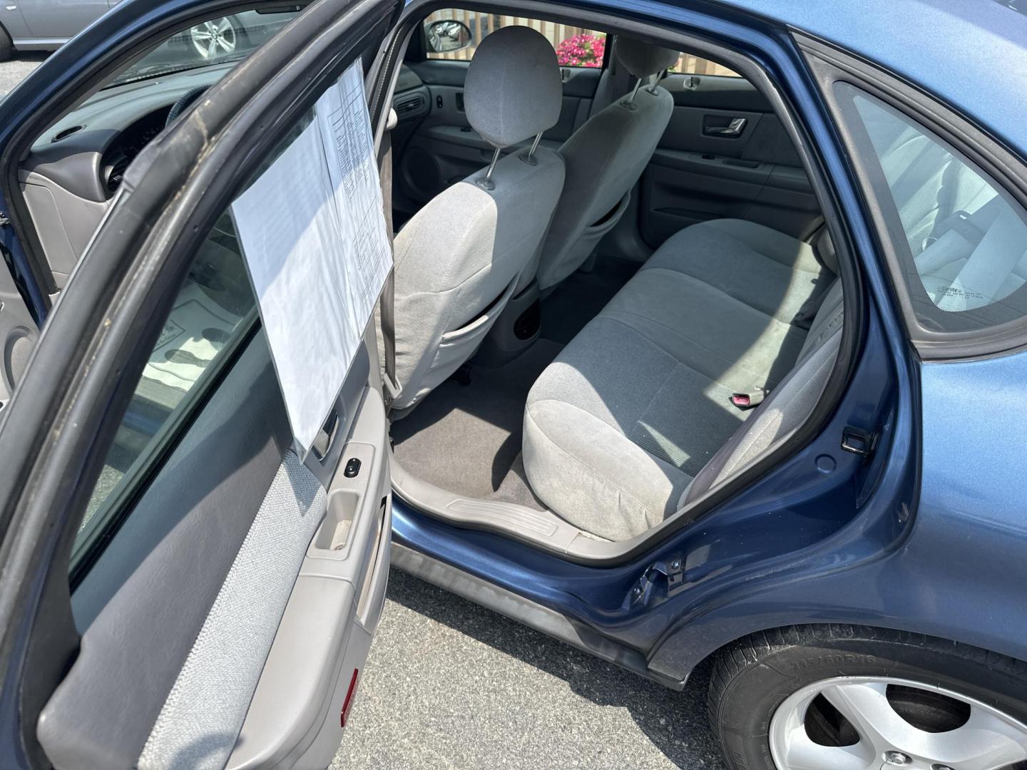 2002 Blue Ford Taurus SES Deluxe (1FAFP55UX2A) with an 3.0L V6 OHV 12V engine, 4-Speed Automatic Overdrive transmission, located at 5700 Curlew Drive, Norfolk, VA, 23502, (757) 455-6330, 36.841885, -76.209412 - Photo#7