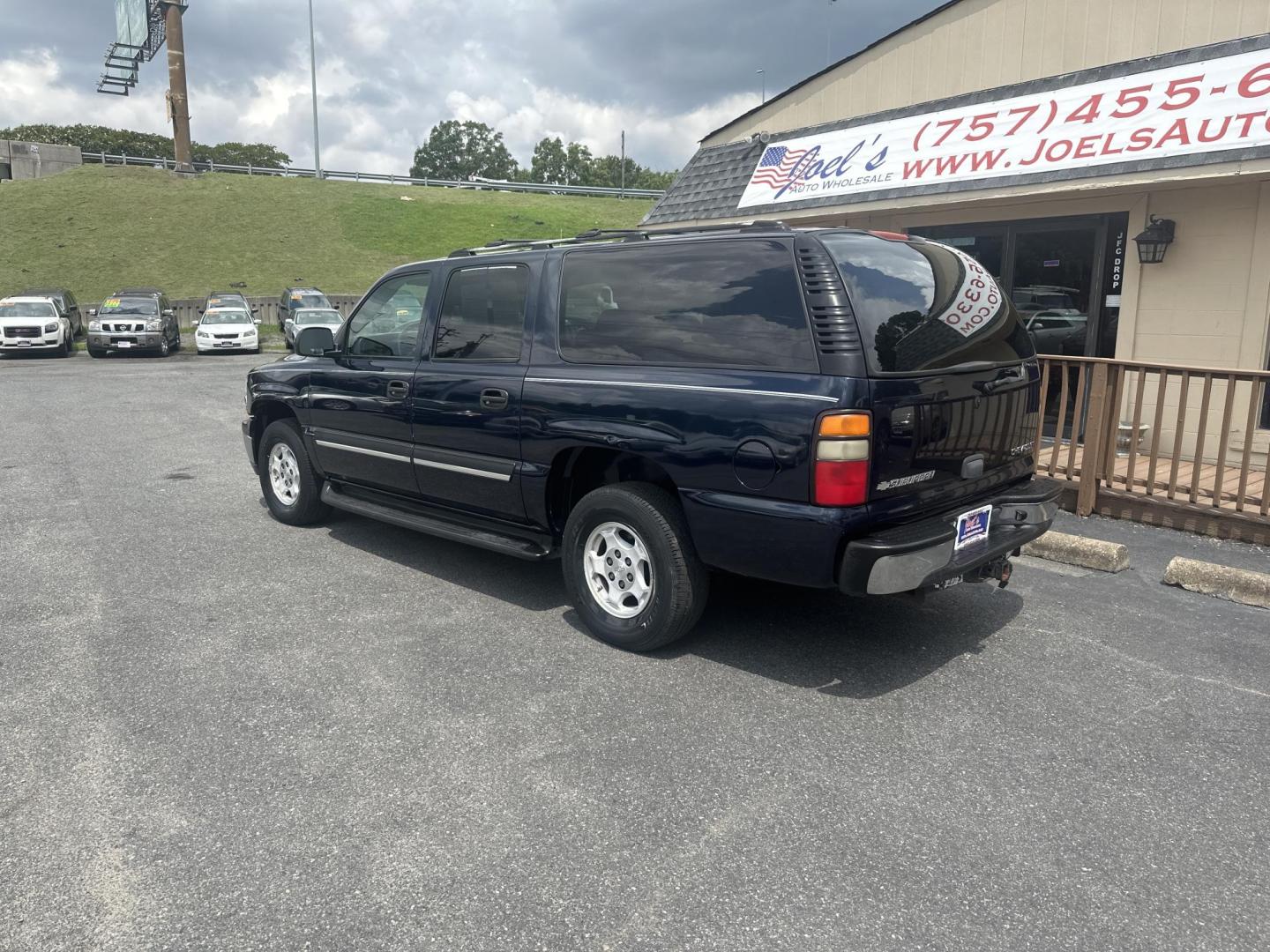 2004 Blue Chevrolet Suburban 1500 2WD (3GNEC16Z64G) with an 5.3L V8 OHV 16V FFV engine, 4-Speed Automatic Overdrive transmission, located at 5700 Curlew Drive, Norfolk, VA, 23502, (757) 455-6330, 36.841885, -76.209412 - Photo#1