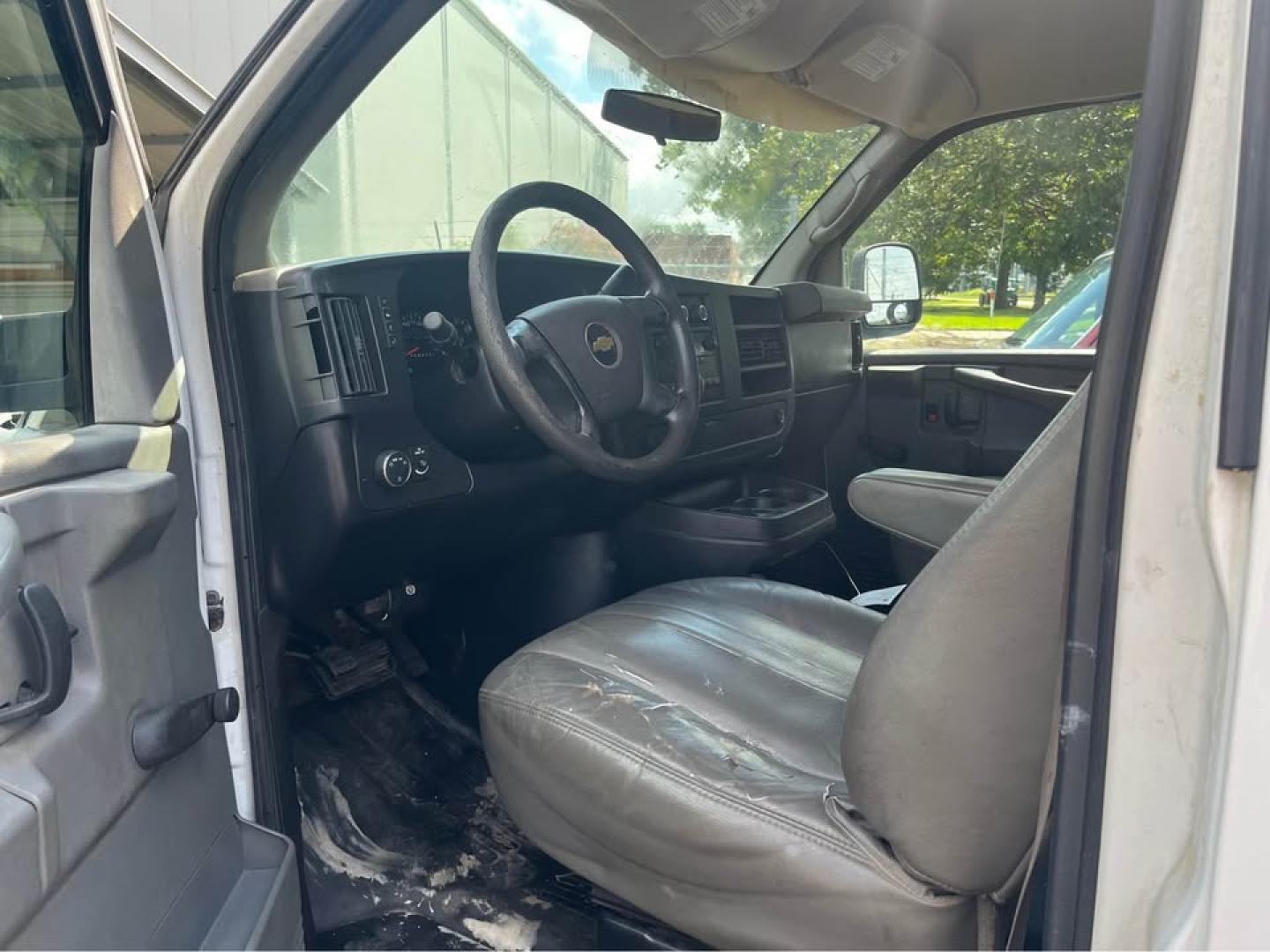 2011 White /Gray Chevrolet Express 1500 Cargo (1GCSGAFX8B1) with an 4.3L V6 OHV 12V engine, 4-Speed Automatic transmission, located at 5700 Curlew Drive, Norfolk, VA, 23502, (757) 455-6330, 36.841885, -76.209412 - CASH SALE NO IN HOUSE FINANCING AVAILABLE -2011 Chevrolet Express 1500 -Rear wheel drive 4.3 v6 -208k miles -No issues ready to work -Cold AC Hot heat -4 new tires -New battery -New state inspection -Virginia dealer - Photo#6