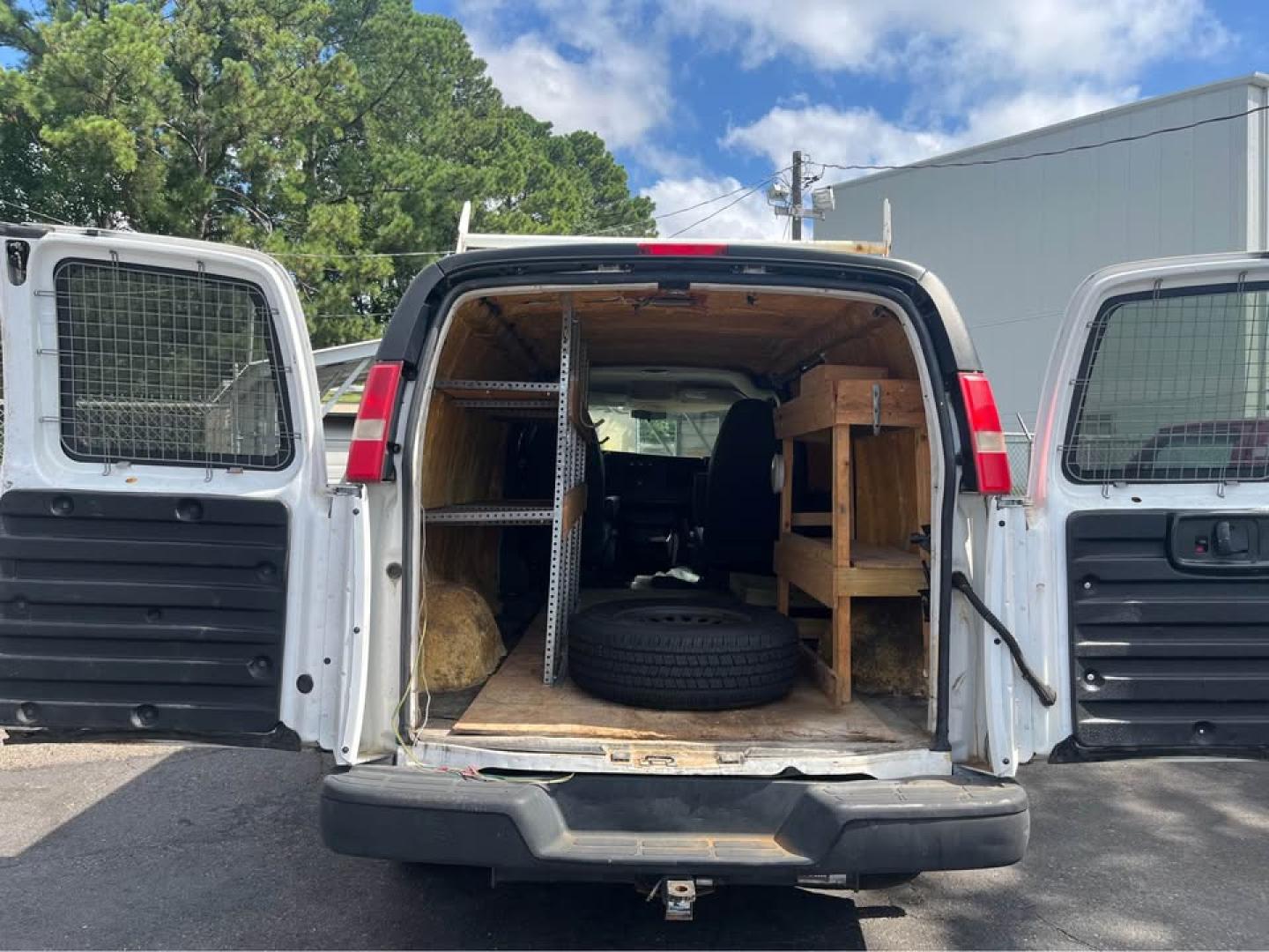 2011 White /Gray Chevrolet Express 1500 Cargo (1GCSGAFX8B1) with an 4.3L V6 OHV 12V engine, 4-Speed Automatic transmission, located at 5700 Curlew Drive, Norfolk, VA, 23502, (757) 455-6330, 36.841885, -76.209412 - CASH SALE NO IN HOUSE FINANCING AVAILABLE -2011 Chevrolet Express 1500 -Rear wheel drive 4.3 v6 -208k miles -No issues ready to work -Cold AC Hot heat -4 new tires -New battery -New state inspection -Virginia dealer - Photo#12