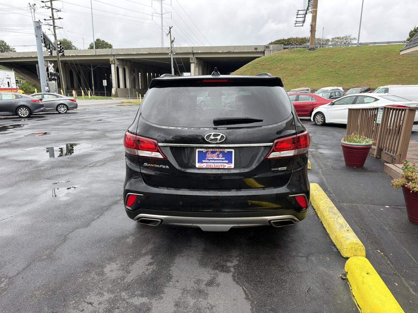 2018 Black Hyundai Santa Fe Ultimate AWD (KM8SRDHF3JU) with an 3.3L V6 DOHC 24V engine, 6A transmission, located at 5700 Curlew Drive, Norfolk, VA, 23502, (757) 455-6330, 36.841885, -76.209412- Photo#2
