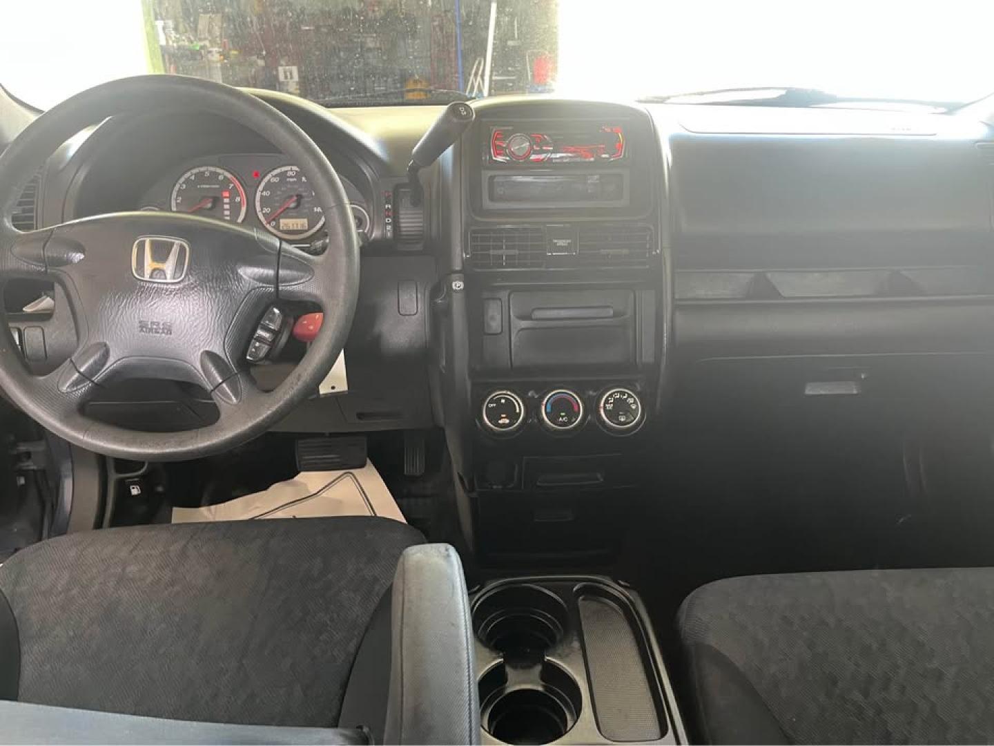 2006 Blue /Black Honda CR-V LX 2WD AT (JHLRD68546C) with an 2.4L L4 DOHC 16V engine, 5-Speed Automatic Overdrive transmission, located at 5700 Curlew Drive, Norfolk, VA, 23502, (757) 455-6330, 36.841885, -76.209412 - -Excellent condition -No issues drives great -Ready for a new owner -New state inspection -Virginia dealer - Photo#8
