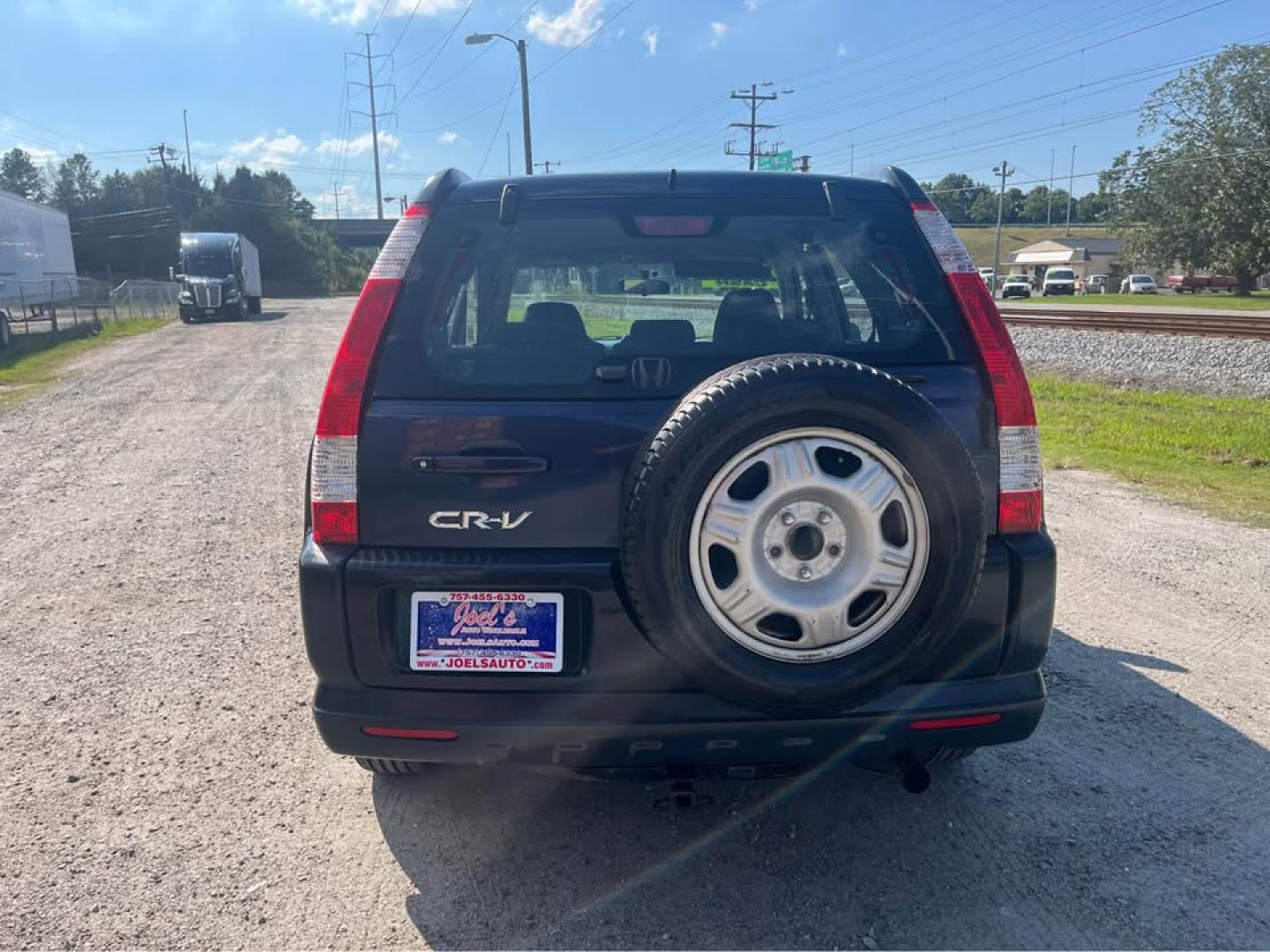 2006 Blue /Black Honda CR-V LX 2WD AT (JHLRD68546C) with an 2.4L L4 DOHC 16V engine, 5-Speed Automatic Overdrive transmission, located at 5700 Curlew Drive, Norfolk, VA, 23502, (757) 455-6330, 36.841885, -76.209412 - -Excellent condition -No issues drives great -Ready for a new owner -New state inspection -Virginia dealer - Photo#3