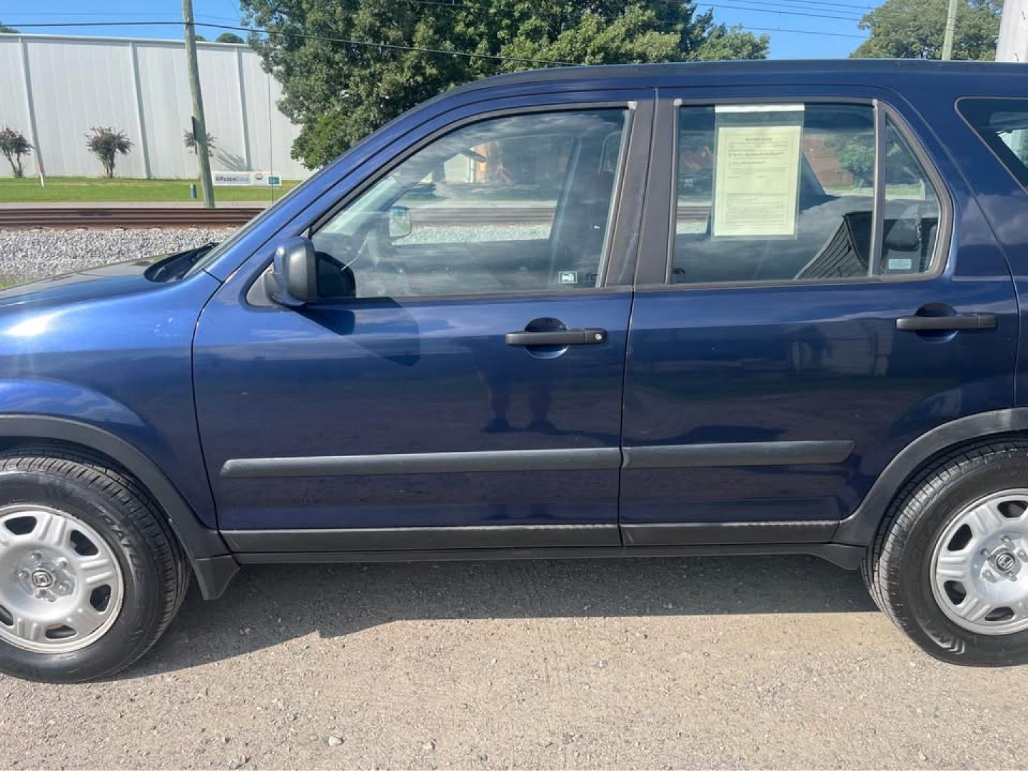 2006 Blue /Black Honda CR-V LX 2WD AT (JHLRD68546C) with an 2.4L L4 DOHC 16V engine, 5-Speed Automatic Overdrive transmission, located at 5700 Curlew Drive, Norfolk, VA, 23502, (757) 455-6330, 36.841885, -76.209412 - -Excellent condition -No issues drives great -Ready for a new owner -New state inspection -Virginia dealer - Photo#1