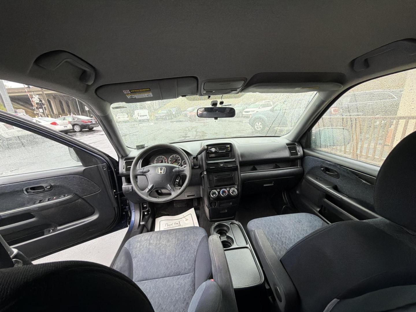 2006 Blue /Black Honda CR-V LX 2WD AT (JHLRD68546C) with an 2.4L L4 DOHC 16V engine, 5-Speed Automatic Overdrive transmission, located at 5700 Curlew Drive, Norfolk, VA, 23502, (757) 455-6330, 36.841885, -76.209412 - Photo#7