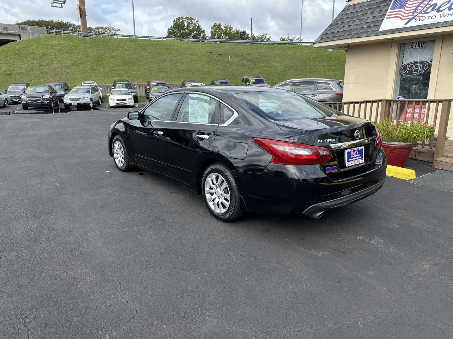 2018 Black Nissan Altima 2.5 (1N4AL3AP1JC) with an 2.5L L4 DOHC 16V engine, CVT transmission, located at 5700 Curlew Drive, Norfolk, VA, 23502, (757) 455-6330, 36.841885, -76.209412 - Photo#1