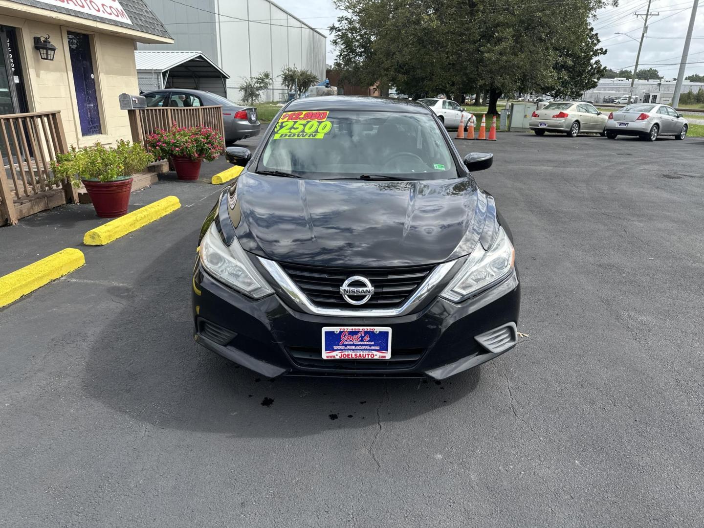 2018 Black Nissan Altima 2.5 (1N4AL3AP1JC) with an 2.5L L4 DOHC 16V engine, CVT transmission, located at 5700 Curlew Drive, Norfolk, VA, 23502, (757) 455-6330, 36.841885, -76.209412 - Photo#4
