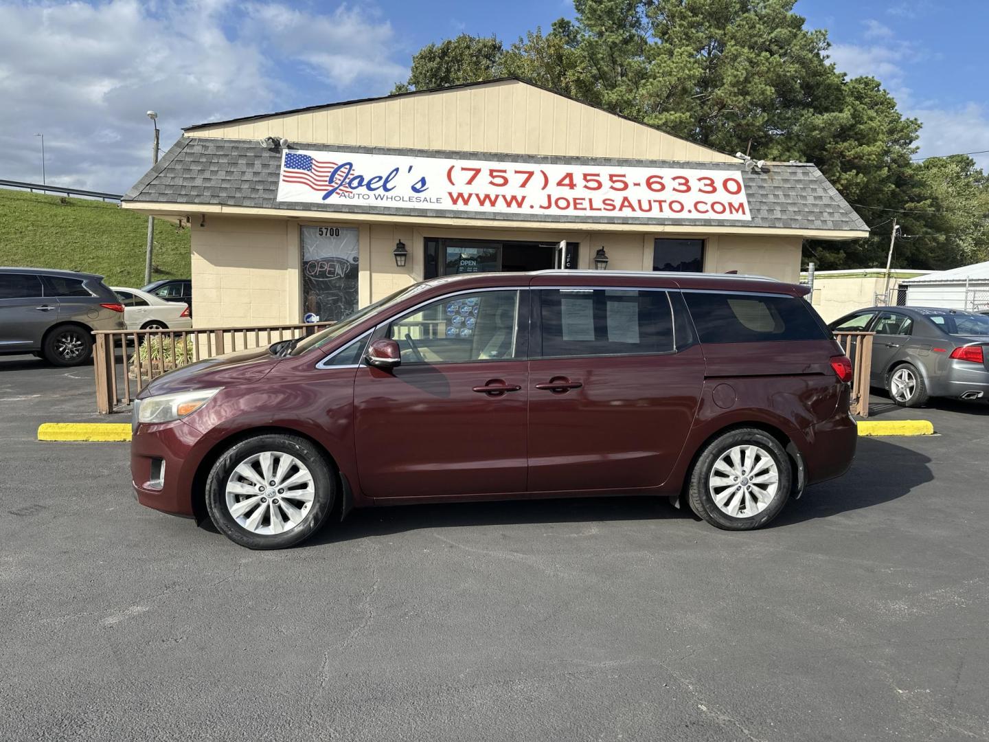 2015 Burgundy Kia Sedona EX (KNDMC5C13F6) with an 3.3L V6 DOHC 24V engine, 6-Speed Automatic transmission, located at 5700 Curlew Drive, Norfolk, VA, 23502, (757) 455-6330, 36.841885, -76.209412 - Photo#1