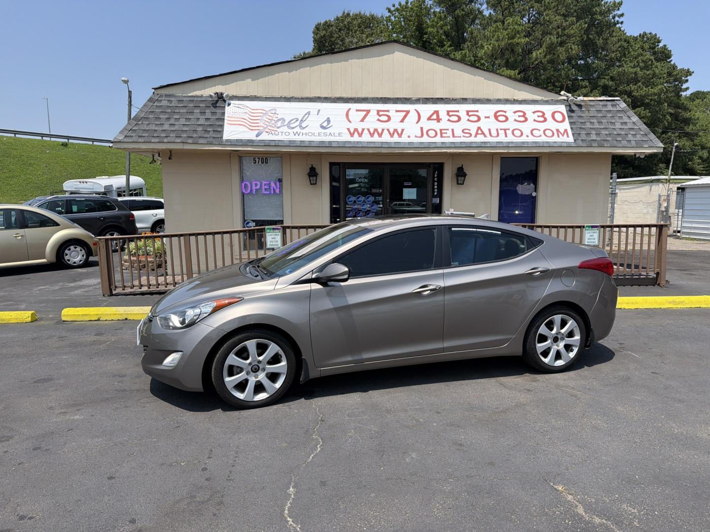 2013 Gold Hyundai Elantra Limited (5NPDH4AE4DH) with an 1.8L L4 DOHC 16V engine, 6-Speed Automatic transmission, located at 5700 Curlew Drive, Norfolk, VA, 23502, (757) 455-6330, 36.841885, -76.209412- Photo#0