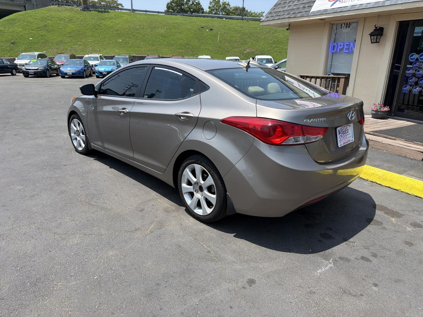 2013 Gold Hyundai Elantra Limited (5NPDH4AE4DH) with an 1.8L L4 DOHC 16V engine, 6-Speed Automatic transmission, located at 5700 Curlew Drive, Norfolk, VA, 23502, (757) 455-6330, 36.841885, -76.209412- Photo#1