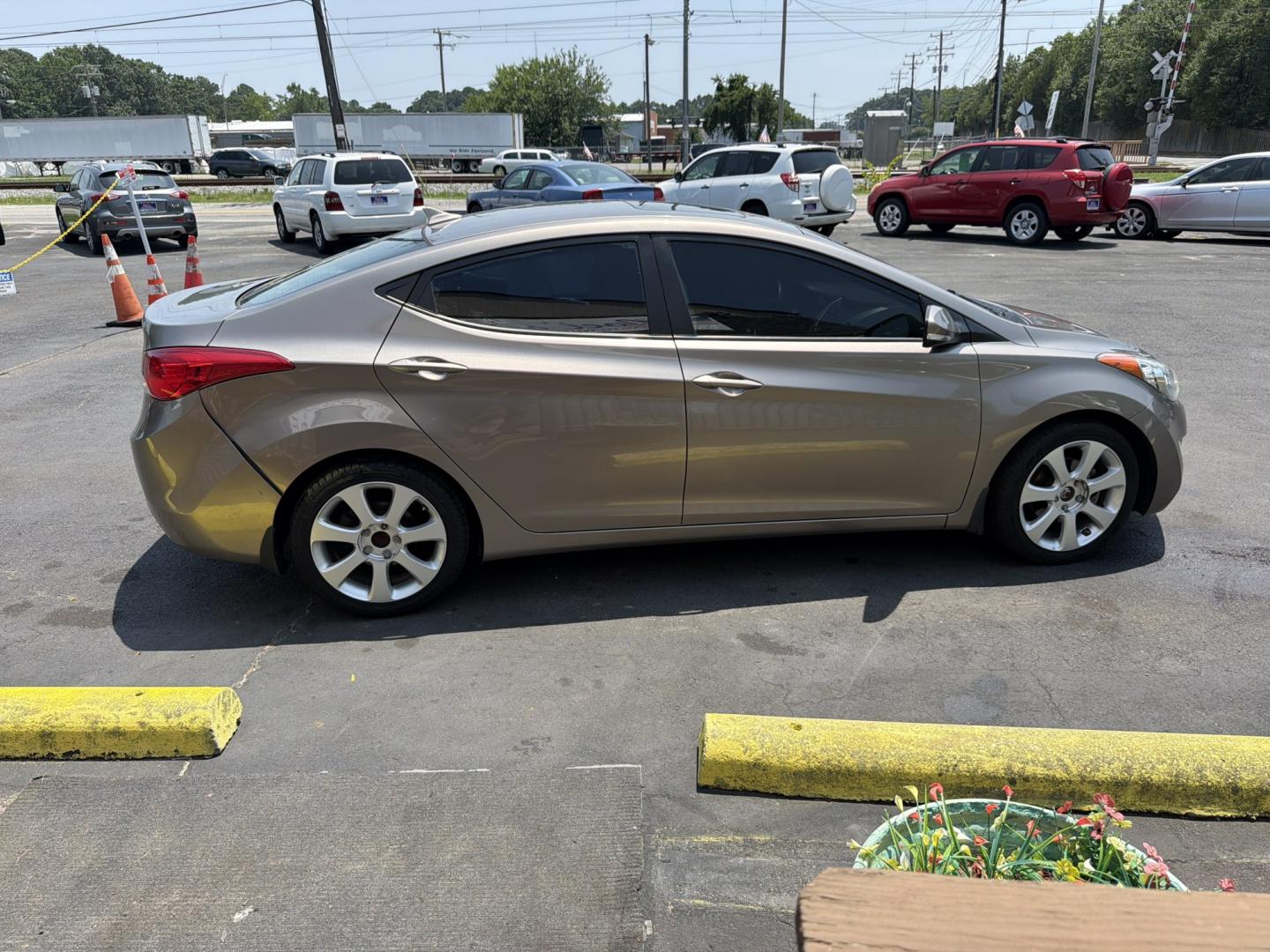 2013 Gold Hyundai Elantra Limited (5NPDH4AE4DH) with an 1.8L L4 DOHC 16V engine, 6-Speed Automatic transmission, located at 5700 Curlew Drive, Norfolk, VA, 23502, (757) 455-6330, 36.841885, -76.209412- Photo#3