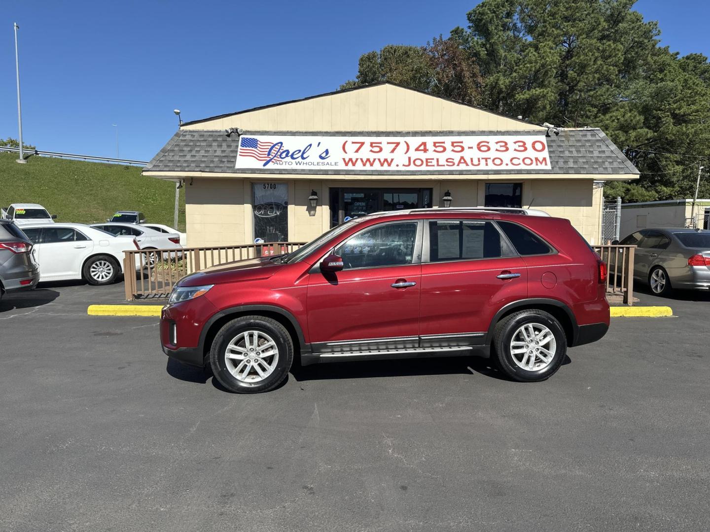 2014 Red /black Kia Sorento LX V6 FWD (5XYKT4A7XEG) with an 3.3L V6 DOHC 24V engine, 6-Speed Automatic transmission, located at 5700 Curlew Drive, Norfolk, VA, 23502, (757) 455-6330, 36.841885, -76.209412 - Photo#1