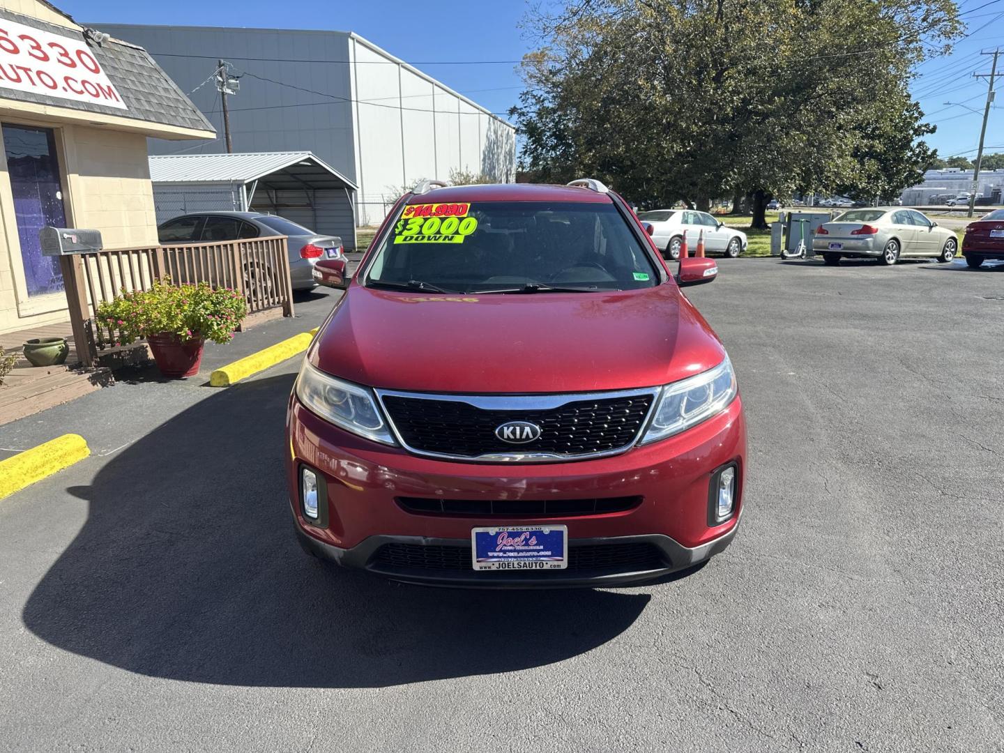 2014 Red /black Kia Sorento LX V6 FWD (5XYKT4A7XEG) with an 3.3L V6 DOHC 24V engine, 6-Speed Automatic transmission, located at 5700 Curlew Drive, Norfolk, VA, 23502, (757) 455-6330, 36.841885, -76.209412 - Photo#5