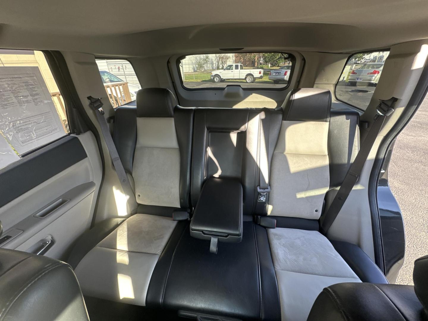 2009 Black Jeep Grand Cherokee Limited 4WD (1J8HR58P89C) with an 4.7L V8 SOHC 16V FFV engine, 5-Speed Automatic transmission, located at 5700 Curlew Drive, Norfolk, VA, 23502, (757) 455-6330, 36.841885, -76.209412 - Photo#10