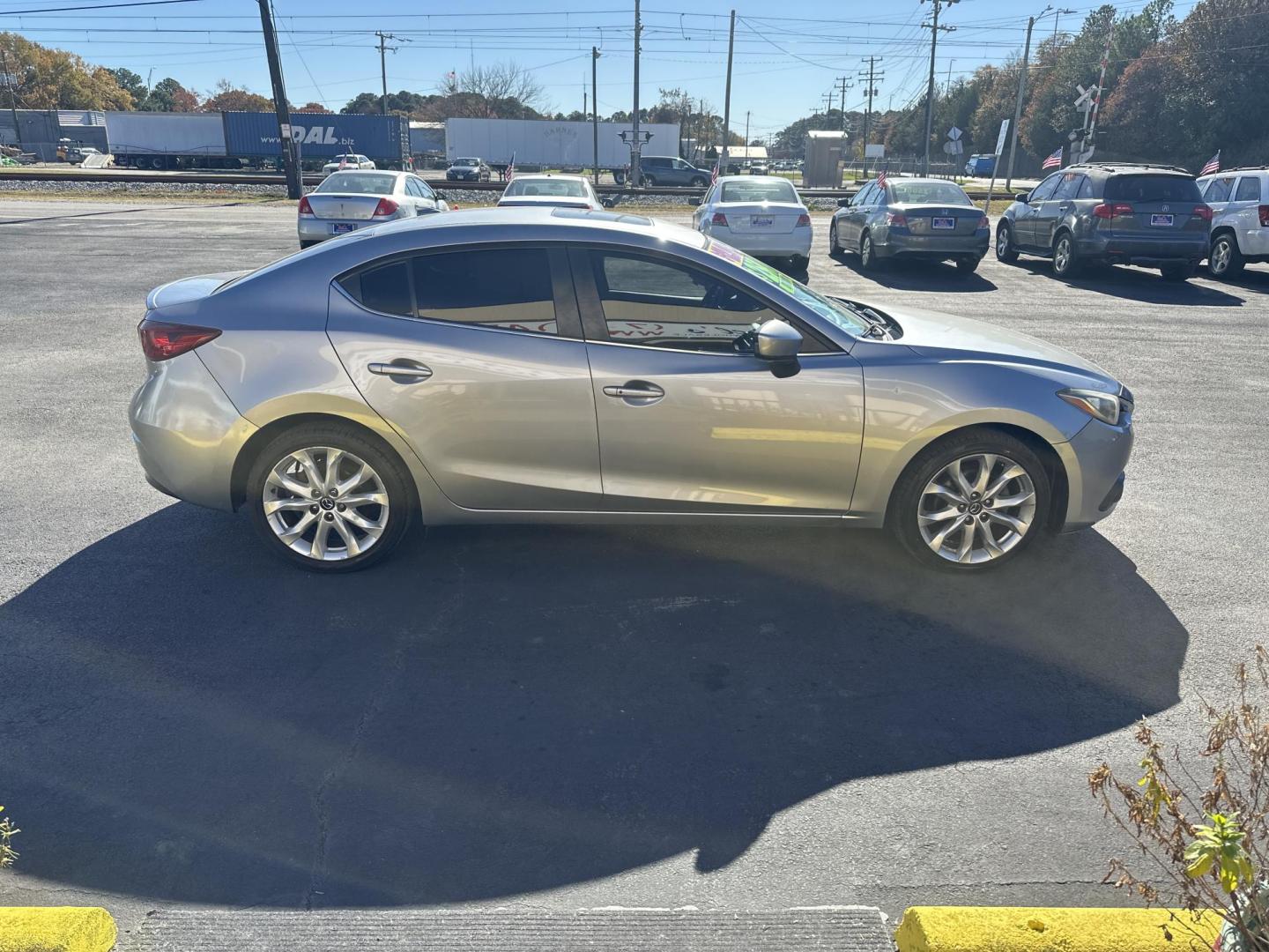 2016 Silver Mazda MAZDA3 s Grand Touring AT 4-Door (JM1BM1W3XG1) with an 2.5L L4 DOHC 16V engine, 6A transmission, located at 5700 Curlew Drive, Norfolk, VA, 23502, (757) 455-6330, 36.841885, -76.209412 - Photo#4