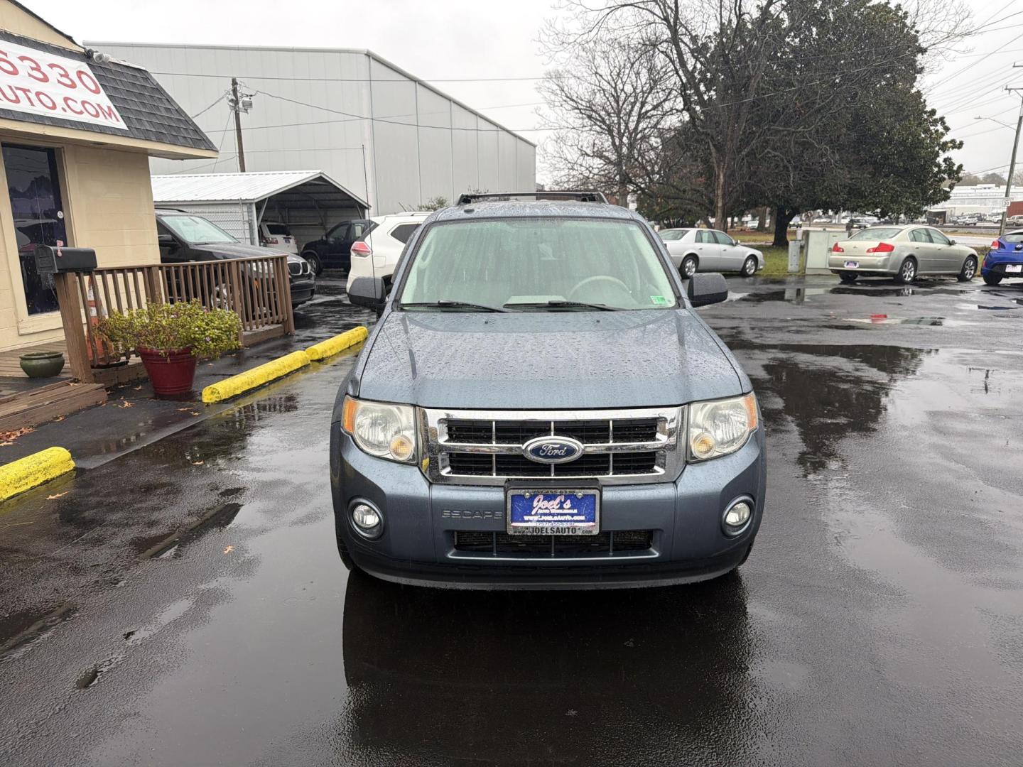 2011 Blue Ford Escape XLT 4WD (1FMCU9DG9BK) with an 3.0L V6 DOHC 24V engine, 6-Speed Automatic transmission, located at 5700 Curlew Drive, Norfolk, VA, 23502, (757) 455-6330, 36.841885, -76.209412 - Photo#5